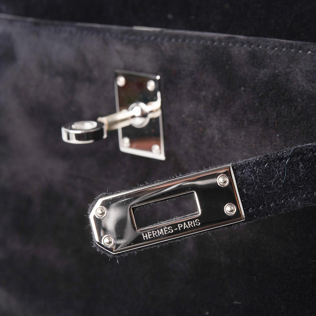 Guaranteed authentic Hermes Kelly Pochette features limited edition Black Doblis.
Rare and absolutely beautiful.
Fresh with palladium hardware.
Signature stamp on interior.
Small interior compartment.
final sale 

BAG MEASURES:
LENGTH  8.75