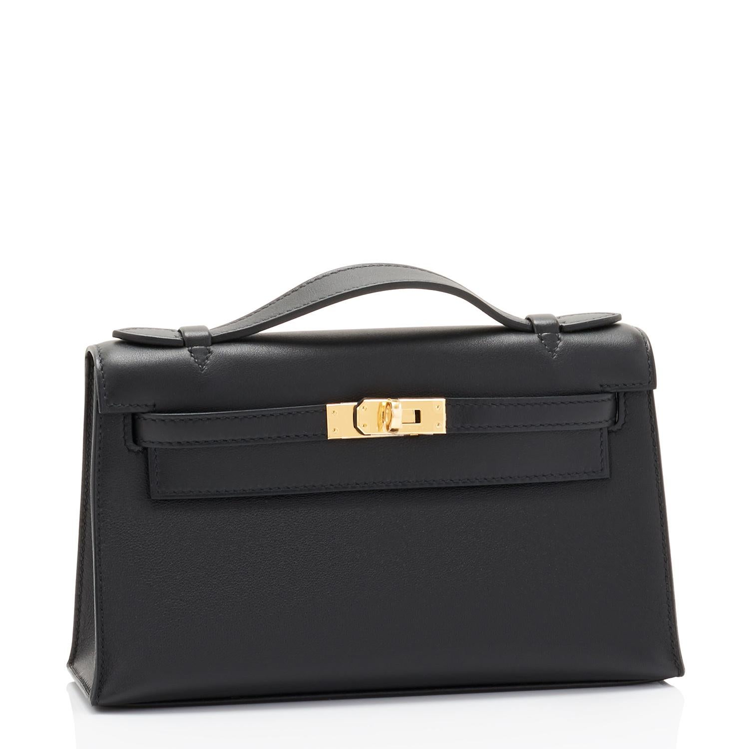 Hermes Kelly Pochette Black Gold Hardware Clutch Cut Bag Swift NEW
Brand New in Box. Store fresh. Pristine condition (with plastic on hardware).
Perfect gift! Comes with sleeper, rain protector, and orange Hermes box.
Kelly Pochette is so very rare.