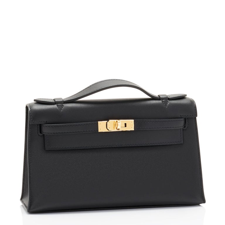 Hermes Kelly Pochette Black Gold Hardware Clutch Cut Bag Z Stamp, 2021 
Just purchased from Hermes store; bag bears new interior 2021 Z Stamp.
Brand New in Box. Store fresh. Pristine condition (with plastic on hardware).
Perfect gift! Comes with