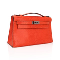 Hermes Kelly Pochette Clutch Bag Tangerine Lizard with Ruthinium Hardware