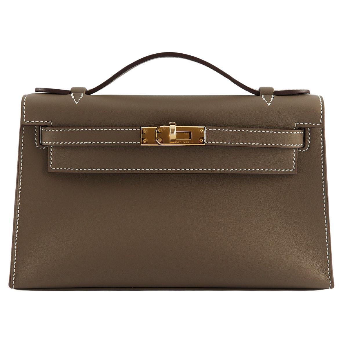 HERMÈS KELLY POCHETTE ETOUPE Swift Leather with Gold Hardware For Sale