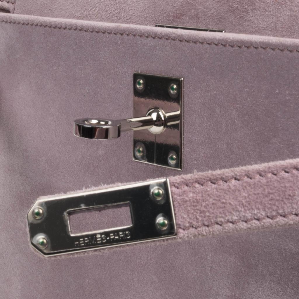 Guaranteed authentic Hermes Kelly Pochette features exquisite Lilac Doblis.
Rare and absolutely beautiful.
Fresh with palladium hardware.
Signature stamp on interior.
Small interior compartment.
Comes with sleeper.
final sale 

BAG MEASURES:
LENGTH 