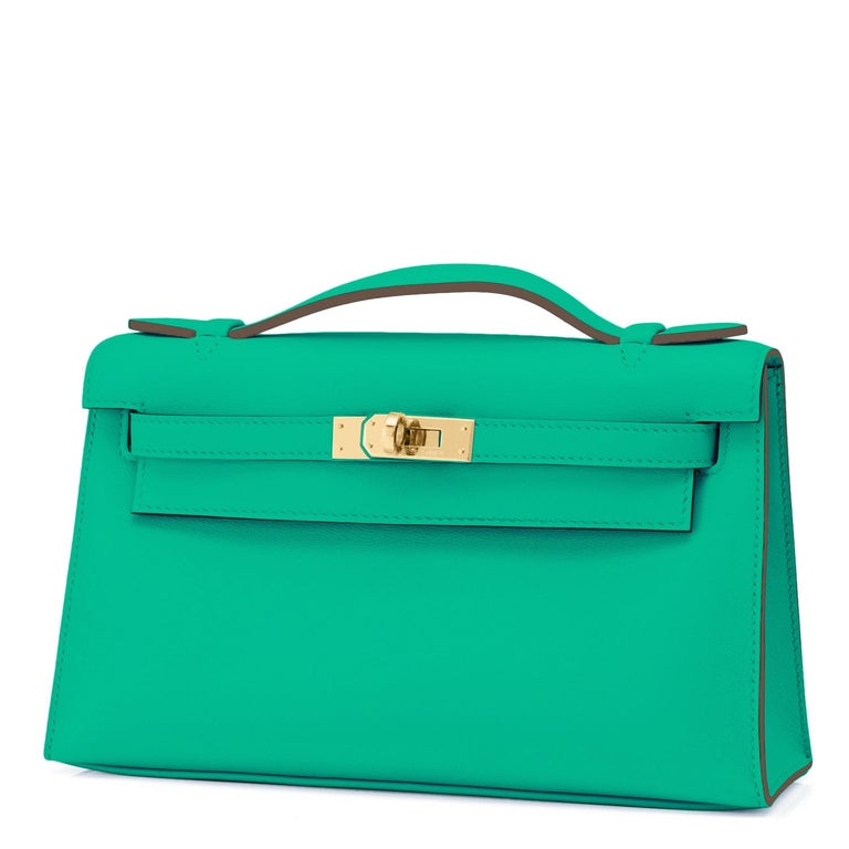 Hermes Kelly Pochette Menthe Gold Hardware Clutch Cut Bag Z Stamp, 2021
Spectacularly gorgeous and rare Menthe is one of the most coveted colors in all of Hermes history!
Rare find! Just purchased from Hermes store; bag bears new 2021 interior Z