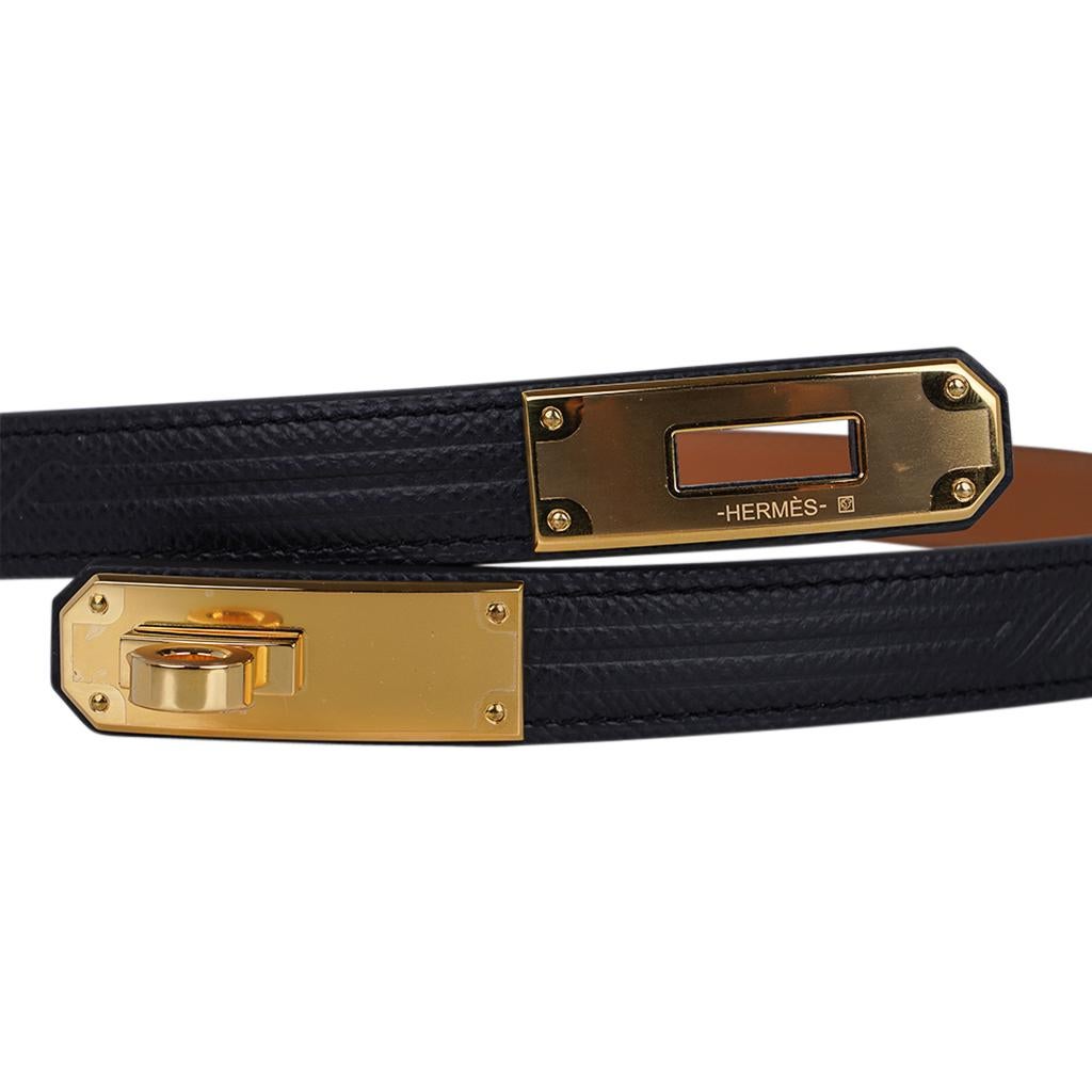 Mightychic offers an Hermes Kelly Quadrige Pocket 18 Belt in Black Epsom leather.
Beautifully embossed design is accentuated with Gold hardware Kelly Buckle.
Super versatile: belt can be worn with or without Pouch and can be
adjusted between 23.6