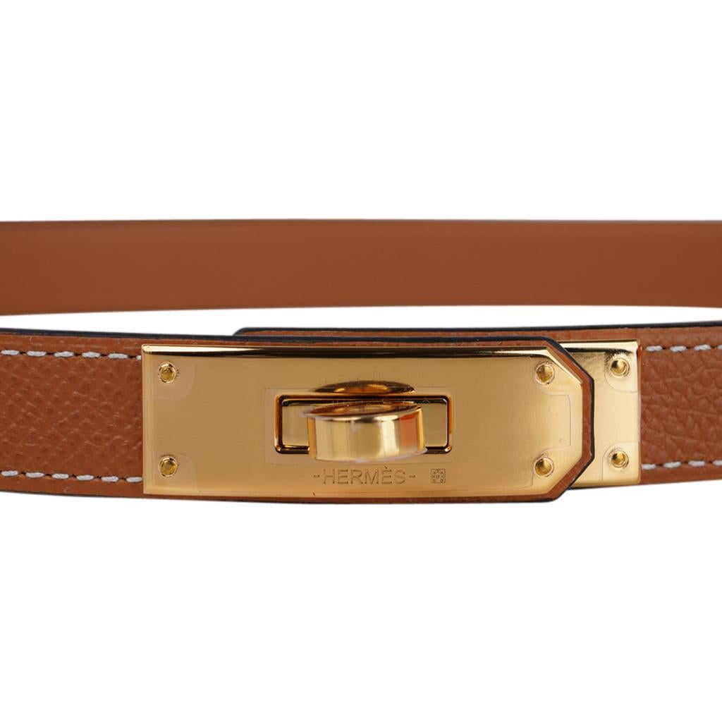 Mightychic offers a guaranteed authentic Hermes Kelly Pocket Belt in Gold with signature bone topstitch.
Stunning with Gold hardware Kelly Buckle set pn Epsom leather.
Super versatile: belt can be worn with or without Pouch and can be adjusted