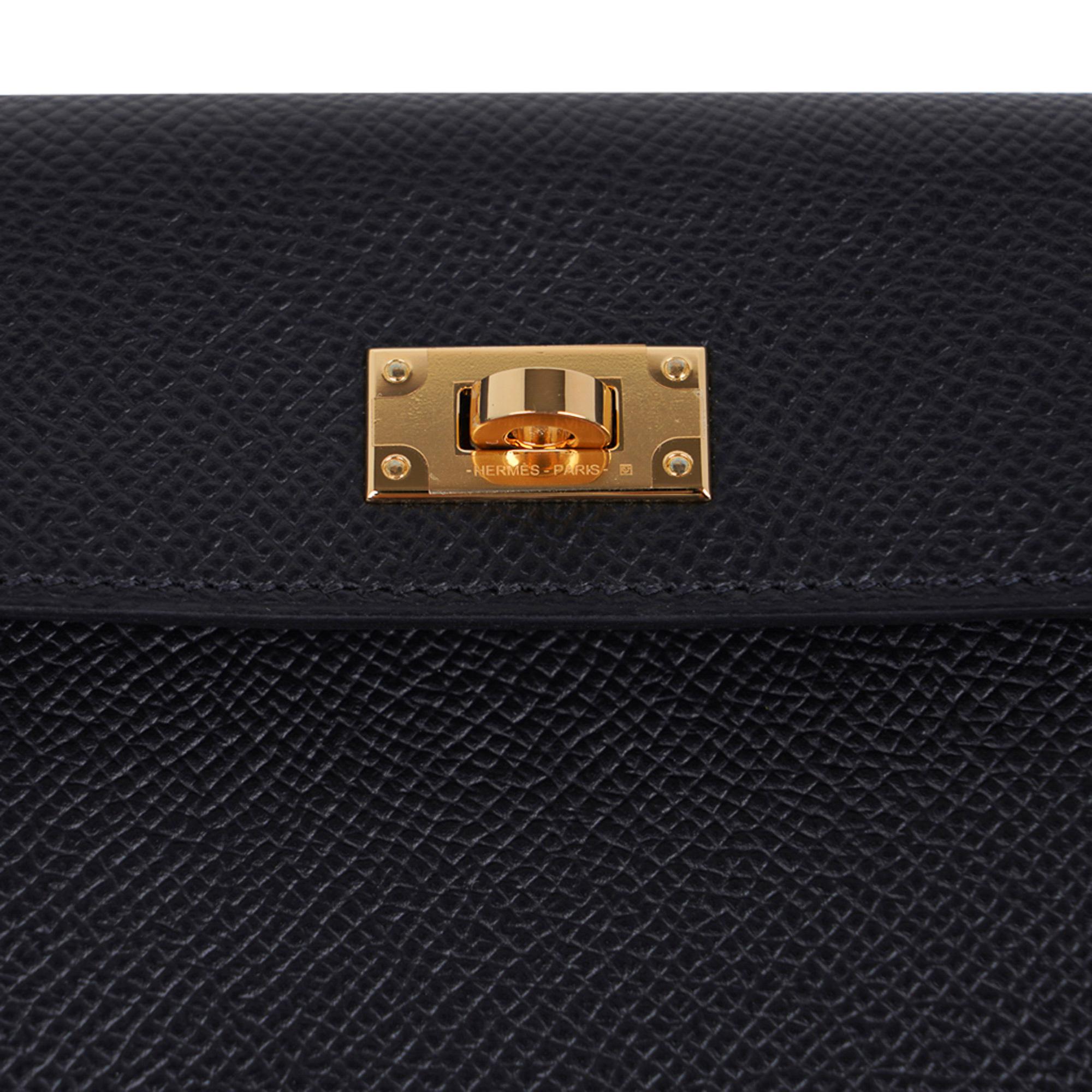 Guaranteed authentic Hermes Pocket Compact Wallet featured in Noir Espom calfskin.
Striking with Gold Hardware, this compact wallet has a central pocket and rear
Kelly Cadena zipped change purse.
NEW or NEVER WORN
final sale

WALLET MEASURES:
LENGTH