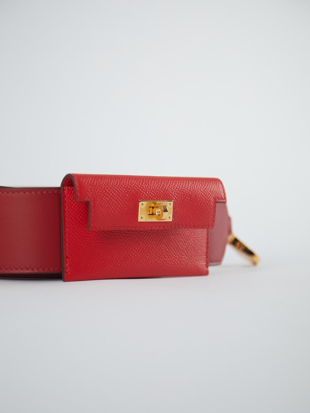 Hermès Kelly Pocket Strap 105cm in Rouge Casaque & Tomate

Epsom and Swift Leather With Gold Hardware

Y Stamp / No Receipt 

The 105cm is the longest length strap and enables most people to wear the bag crossbody, as well as on the