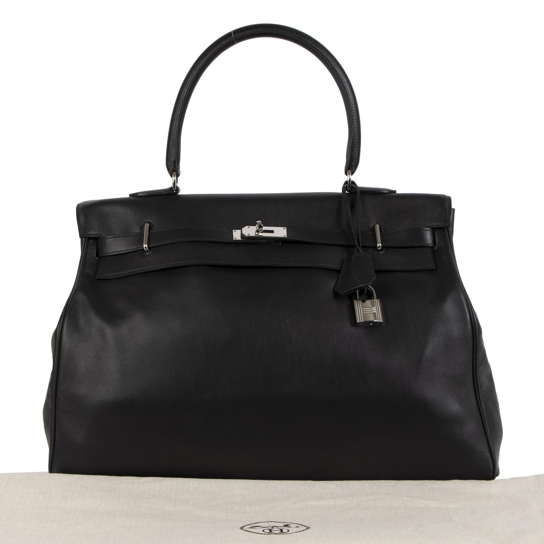 You can travel in style - or you can go the extra mile and travel in complete luxury with this limited edition Hermès Kelly Relax 50 Travel Bag. This oversized beauty comes in black Sikkim leather, a very soft, lightweight and smooth goat leather