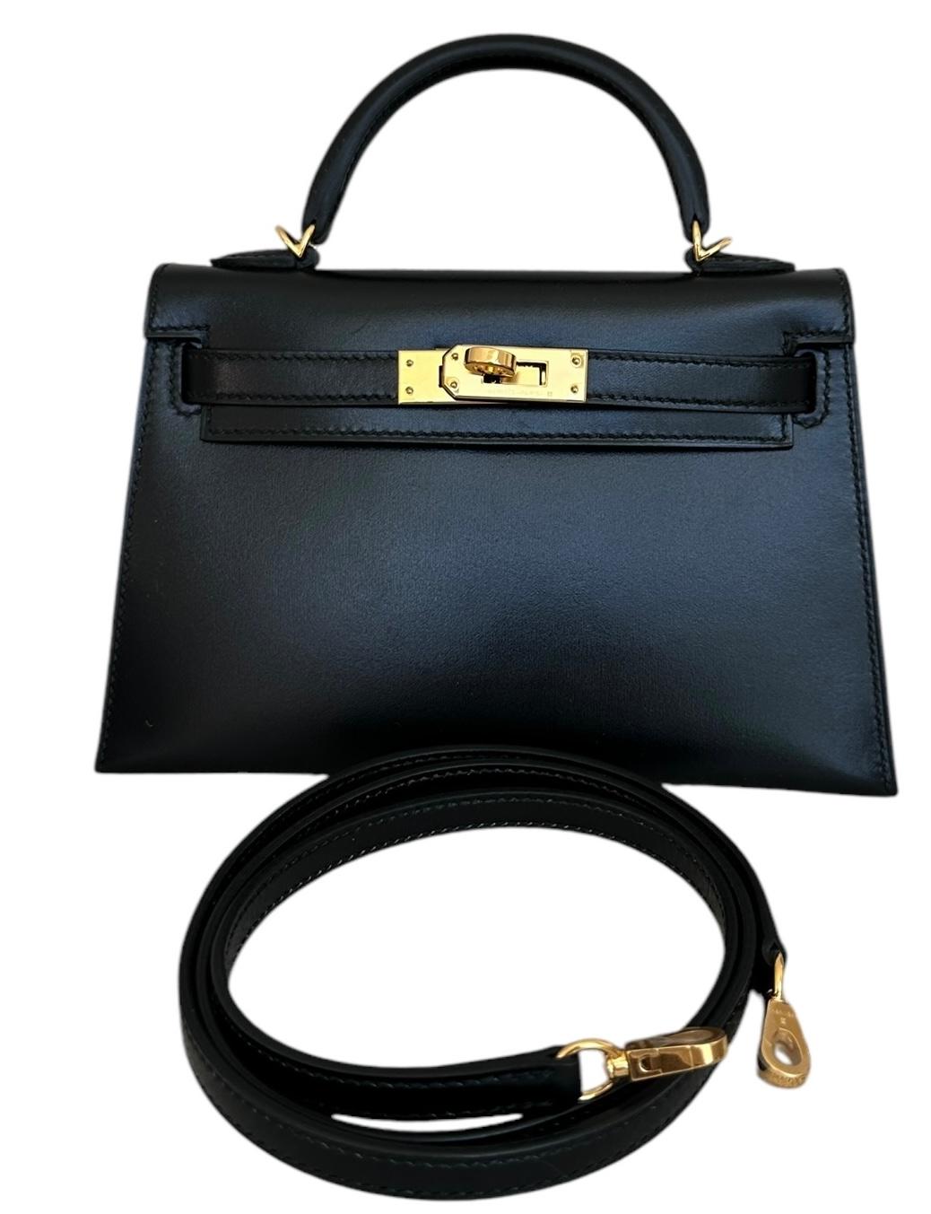 Hermes
Called the Mini Kelly
20cm 
Just arrived from the Hermes Boutique
Black Box leather, rare to find
Gold Hardware

This Kelly, in the Sellier style, is in one of the most popular colors Hermes sells, Etoupe, a perfect neutral, in epsom leather