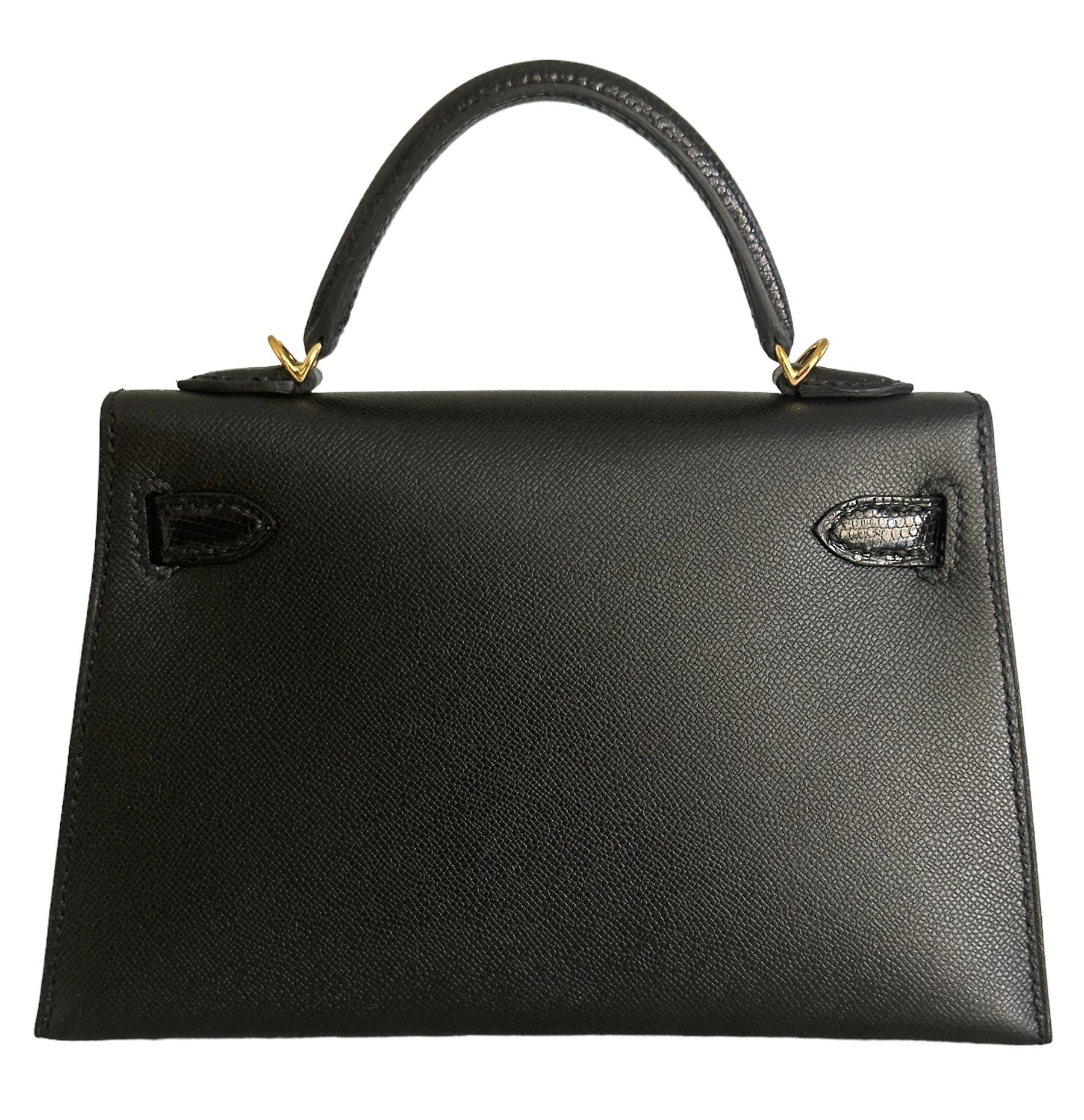 Hermes
Called the Mini Kelly
20cm Touch
Very Rare, you will not see too many of these produced
Varanus Niloticus Lizard on handle and closure straps
Black with Black and Gold Hardware
Just arrived from the Hermes Boutique
 Front toggle closure,