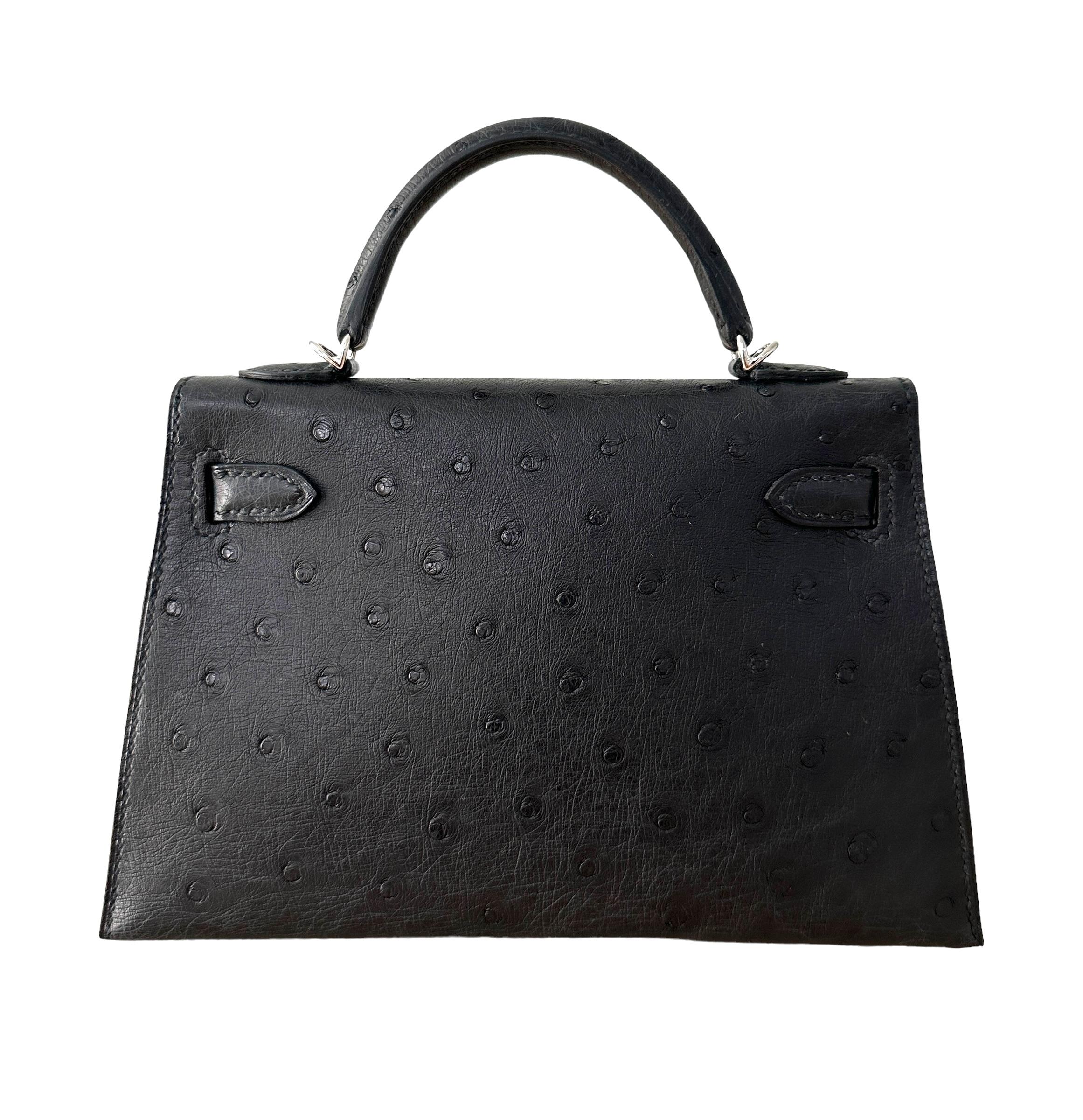 Hermes
Called the Mini Kelly Bag
20cm Ostrich
Ostrich is very hard to come by these days. It is being produced less and less.
Very Rare
You will not find this, we have it ready to ship right here in the U.S.

Black with Palladium Hardware
Just