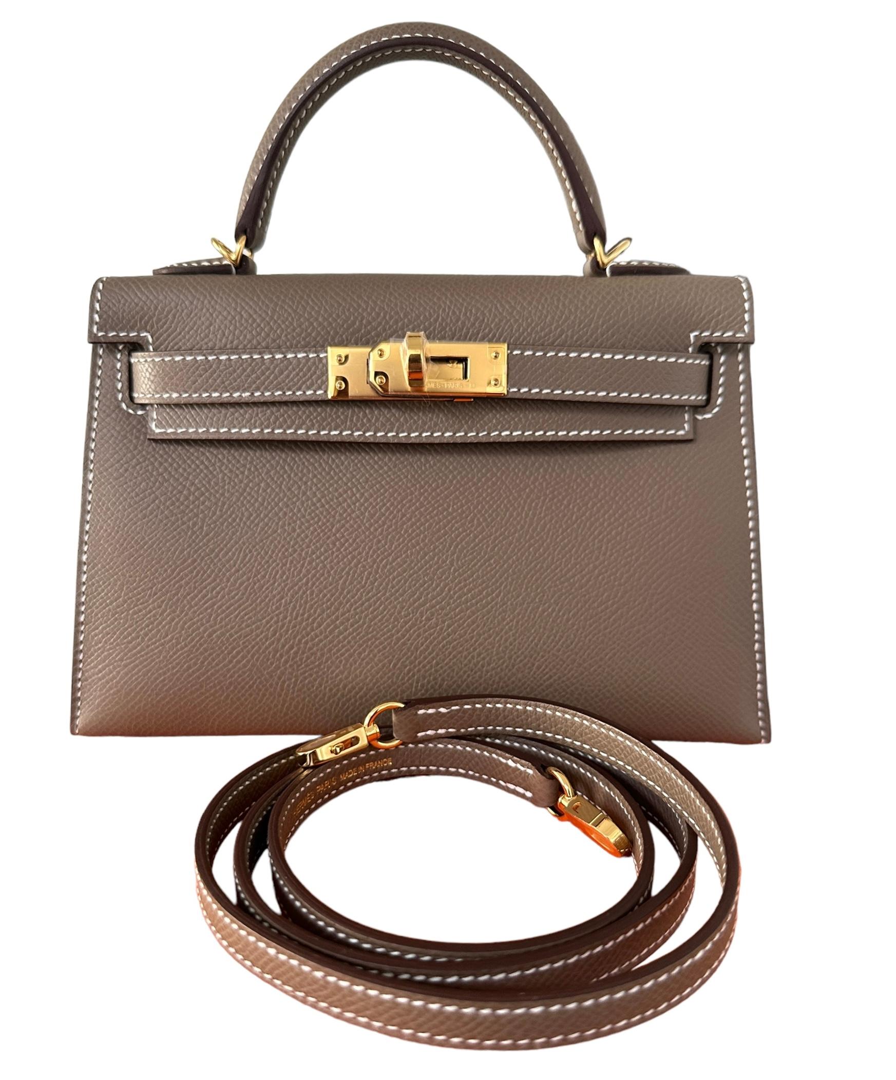 Hermes
Called the Mini Kelly
20cm 
Just arrived from the Hermes Boutique
This Kelly, in the Sellier style, is in one of the most popular colors Hermes sells, Etoupe, a perfect neutral, in epsom leather with gold hardware and has contrast stitching