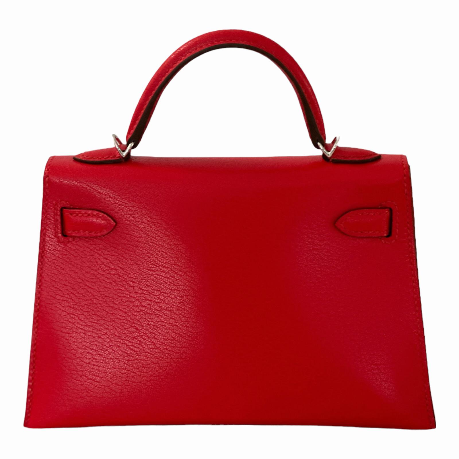 Guaranteed authentic Hermes Kelly 20 Sellier bag featured in stunning Rouge de Coeur.  
Rouge de coeur is a vibrant red, so gorgeous!
Leather is Chevre, one of the most collected leathers because of its durability 
The Hermes Kelly 20 is a small