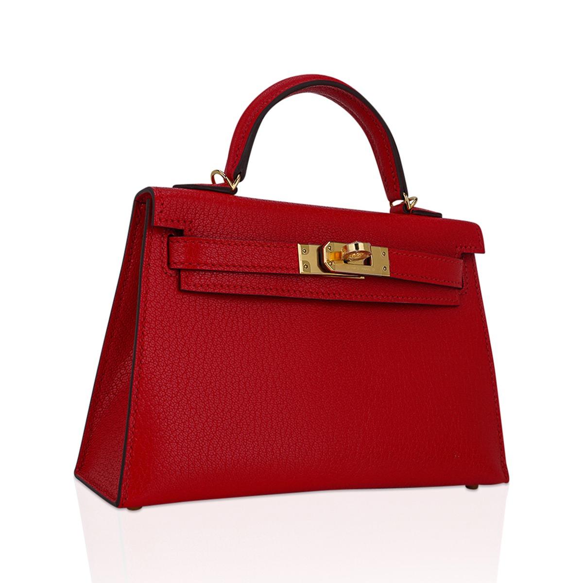 Mightychic offers an Hermes Kelly 20 Sellier bag featured in stunning Rouge de Coeur.  
Vibrant and richly saturated. this true red Hermes Kelly Mini 20 bag will set your heart aflutter.
Chevre leather has an exotic natural grain  and shows colours