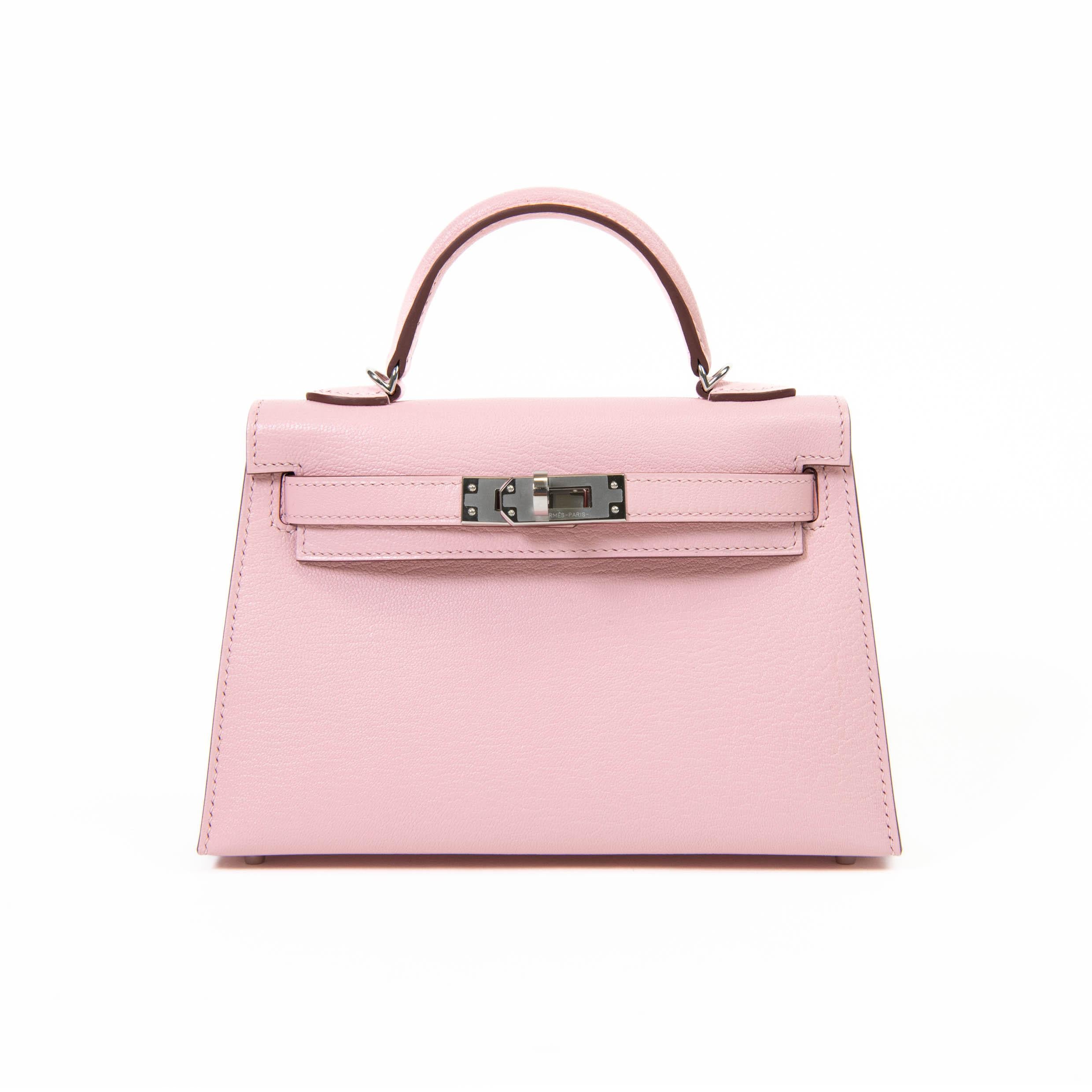 100% Authentic 

This Kelly in Rose Sakura chevre Goatskin leather with palladium hardware With tonal stitching, two straps with front toggle closure, single rolled handle and removable shoulder strap.

The interior is lined with Rose Sakura