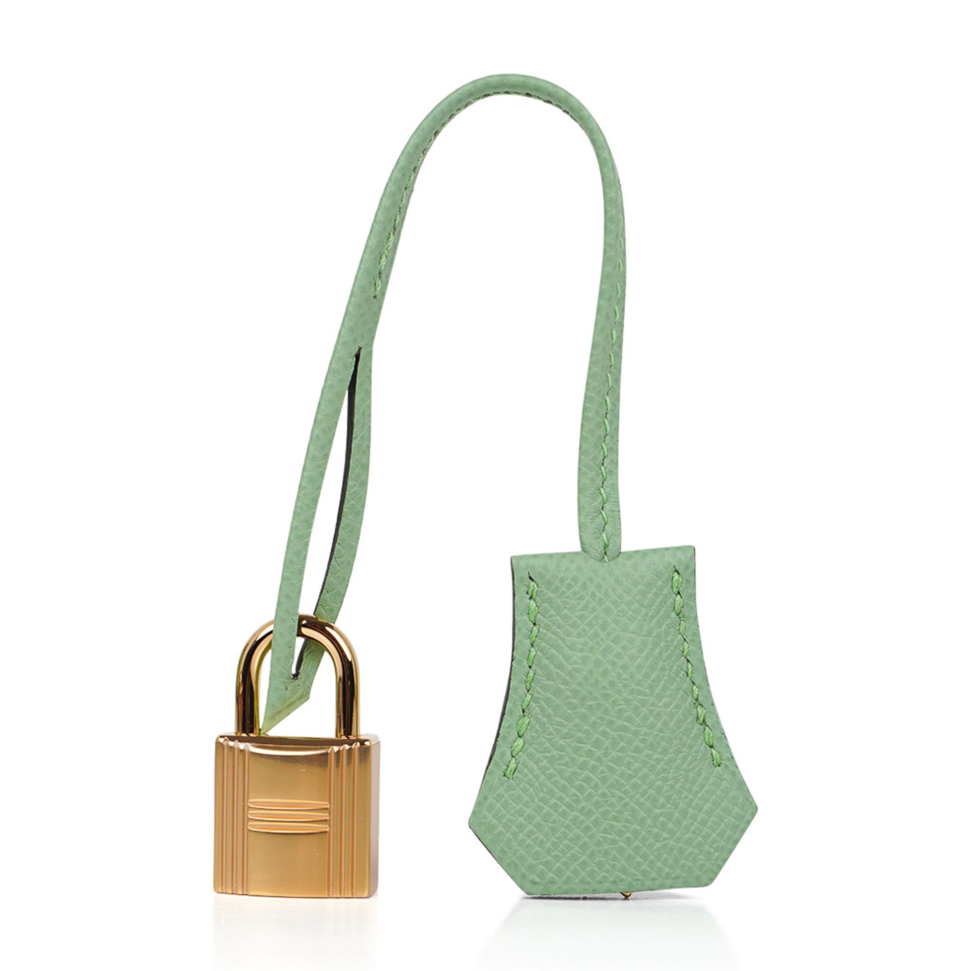 Guaranteed authentic Hermes Kelly Sellier 25 bag featured in fresh Vert Criquet. 
Stunning Hermes light green that is absolutely neutral. 
Luxurious with gold hardware. 
Comes with signature Hermes box, raincoat, shoulder strap, sleepers, lock, keys