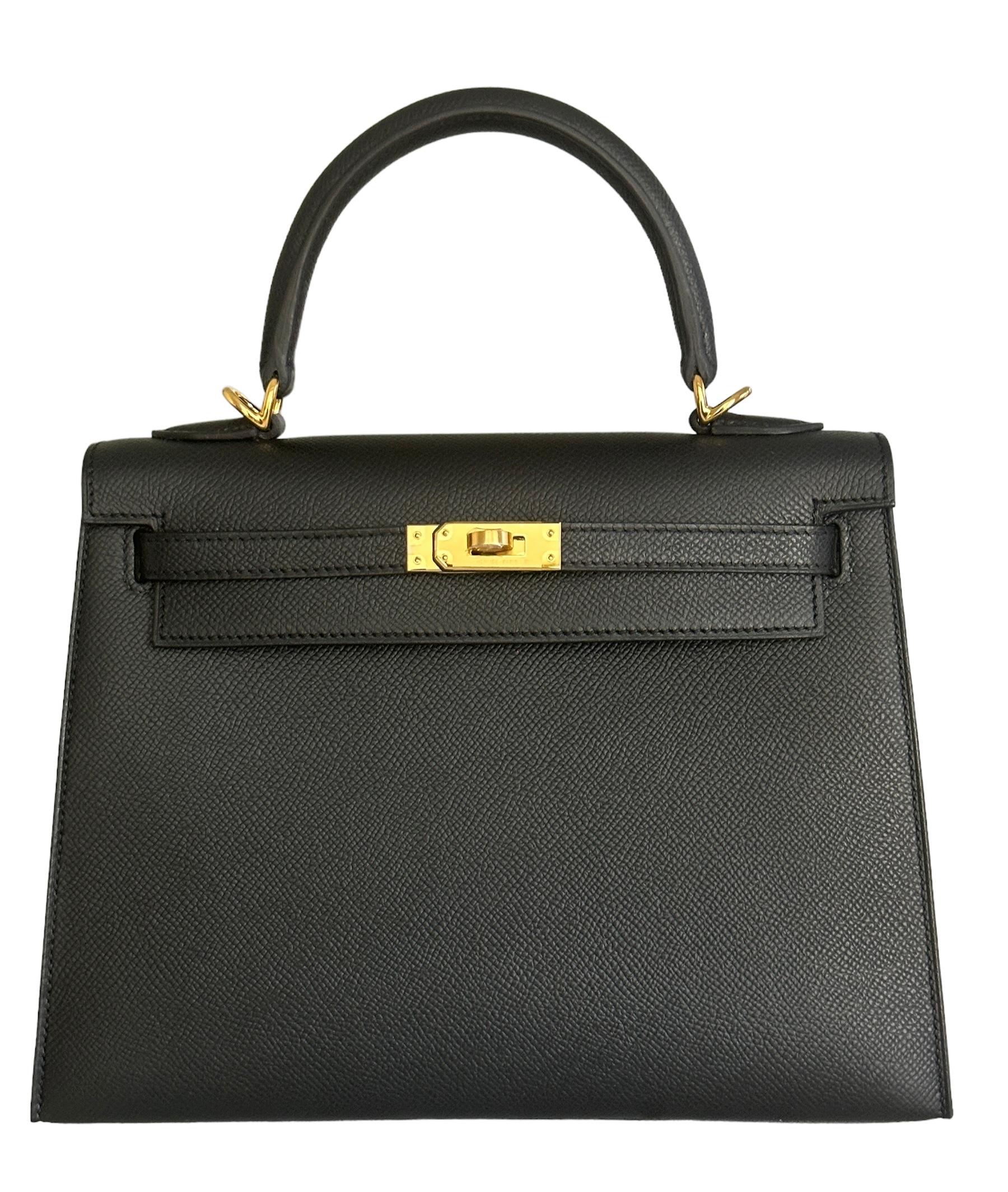 
Hermes Kelly 25
Black Epsom
Gold Hardware
Collection: W
Origin: France
The interior is lined with Black chevre leather and has one zip pocket with an Hermes engraved pull and one open pocket on the opposite side.

Condition: Pristine; new / never