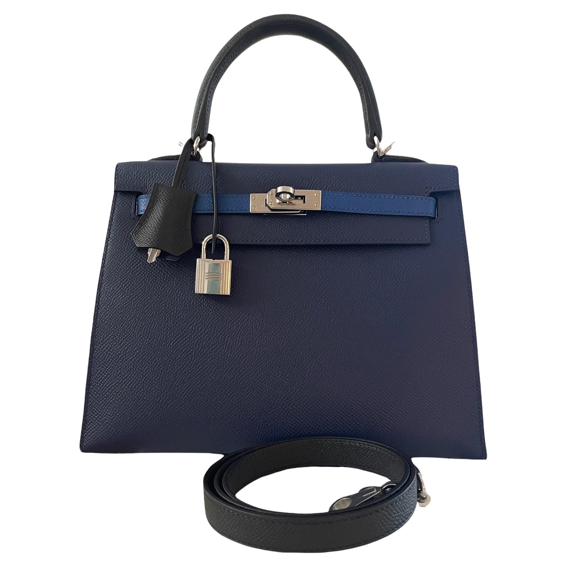 Hermes
Kelly 25cm Sellier
Most desired size in a Kelly
Tri Tones 
Introduced as a Limited Edition 
3 colors

The bag is blue saphire, the straps are blue france, and the handle is black, inside is blue saphire.
Dont miss out 
This Tri-Color Kelly is
