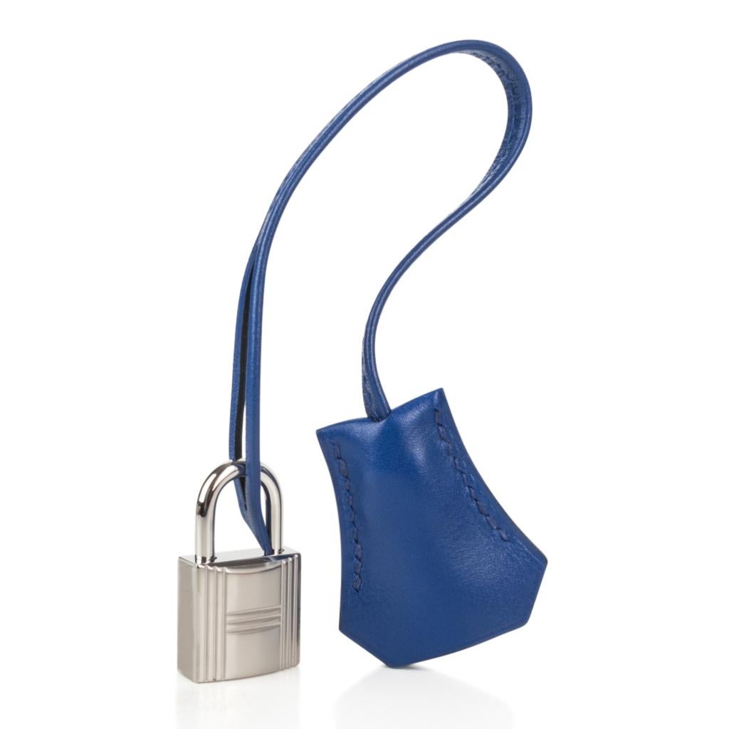 Guaranteed authentic Hermes Kelly 28 Sellier features vivid rich Blue Electric in luxurious Tadelakt leather. 
This iconic Hermes bag is timeless and chic.
Fresh and crisp with palladium hardware.   
This beauty is a perfect year round beauty.
Comes