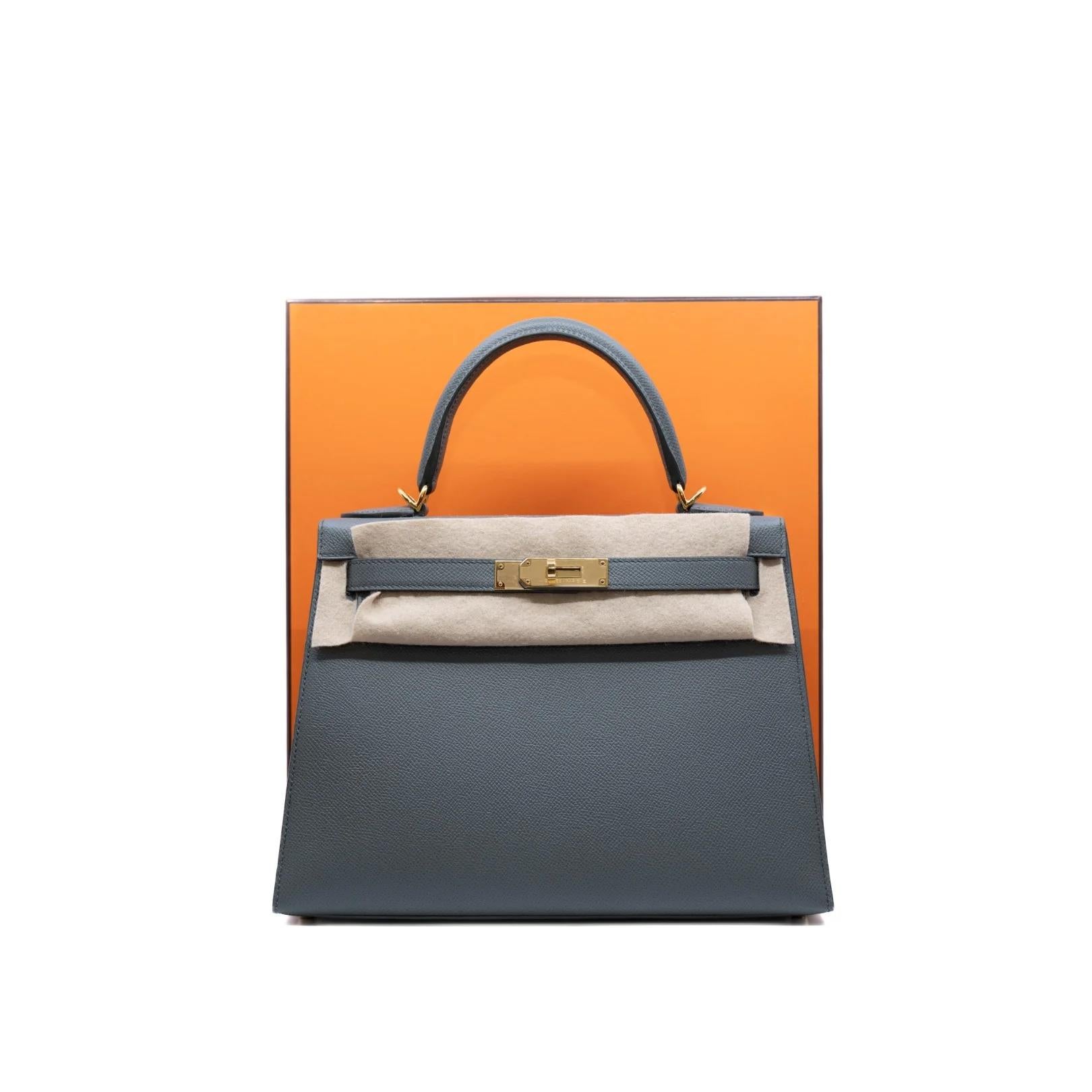 1stdibs Exclusives From Three Over Six

The brand new Hermès Kelly Sellier 28cm in Vert Amande Epsom Leather with Gold Hardware is an exquisite testament to the timeless elegance and craftsmanship for which Hermès is renowned. This stunning bag,