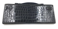 Hermès Kelly Shiny Porosus Crocodile with Diamonds Black Clutch