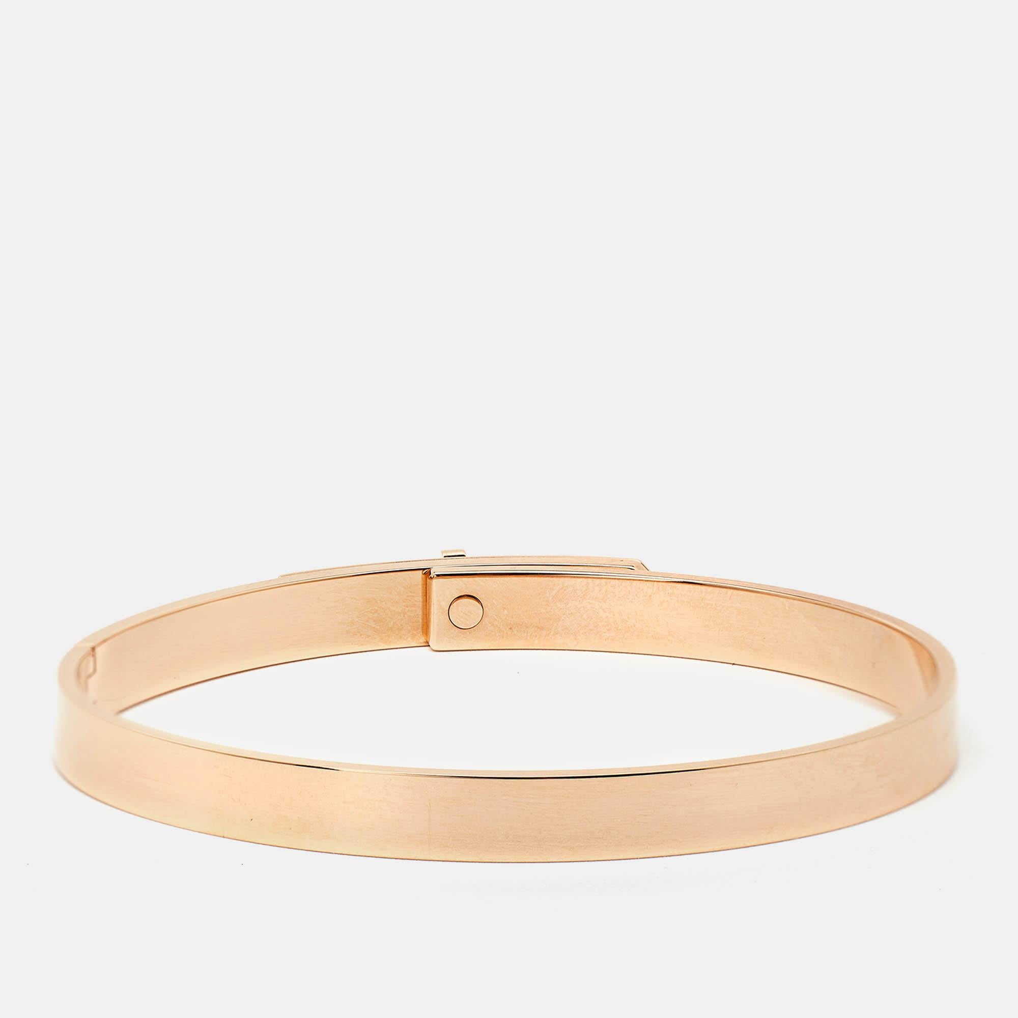 The Kelly is a name synonymous with Hermes. It is a symbol of their wondrous dedication to craftsmanship and classic style. This bangle bracelet carries the iconic Kelly lock and it comes crafted with 18k rose gold. The lock is breathtakingly