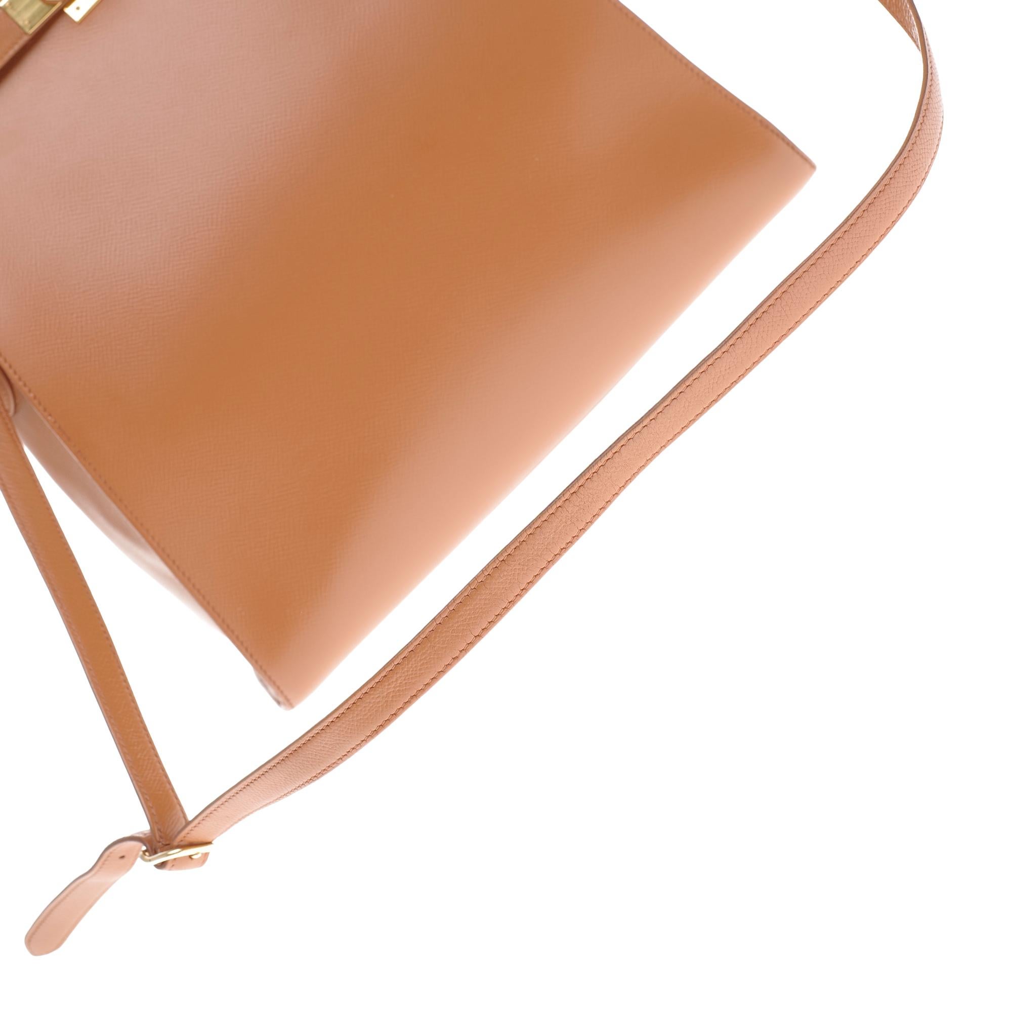 Hermès Kelly sport shoulder bag in courchevel gold leather with gold hardware 1