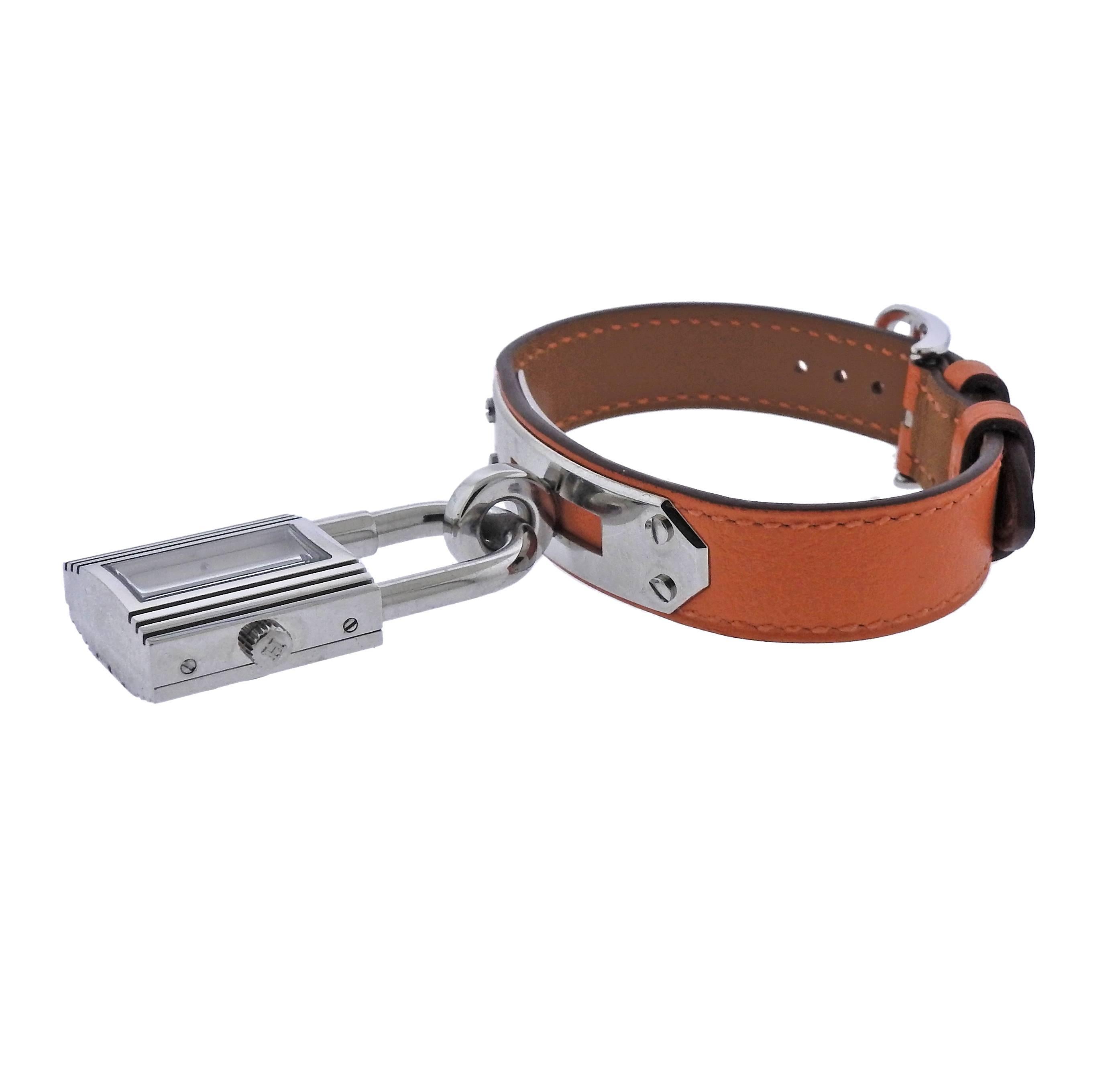 Stainless steel Kelly charm watch bracelet, crafted by Hermes.  Bracelet is 7