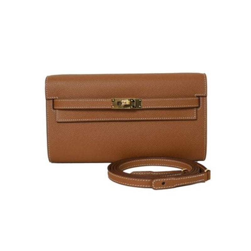 Hermès - Portefeuille Kelly To-Go doré avec accessoires en or