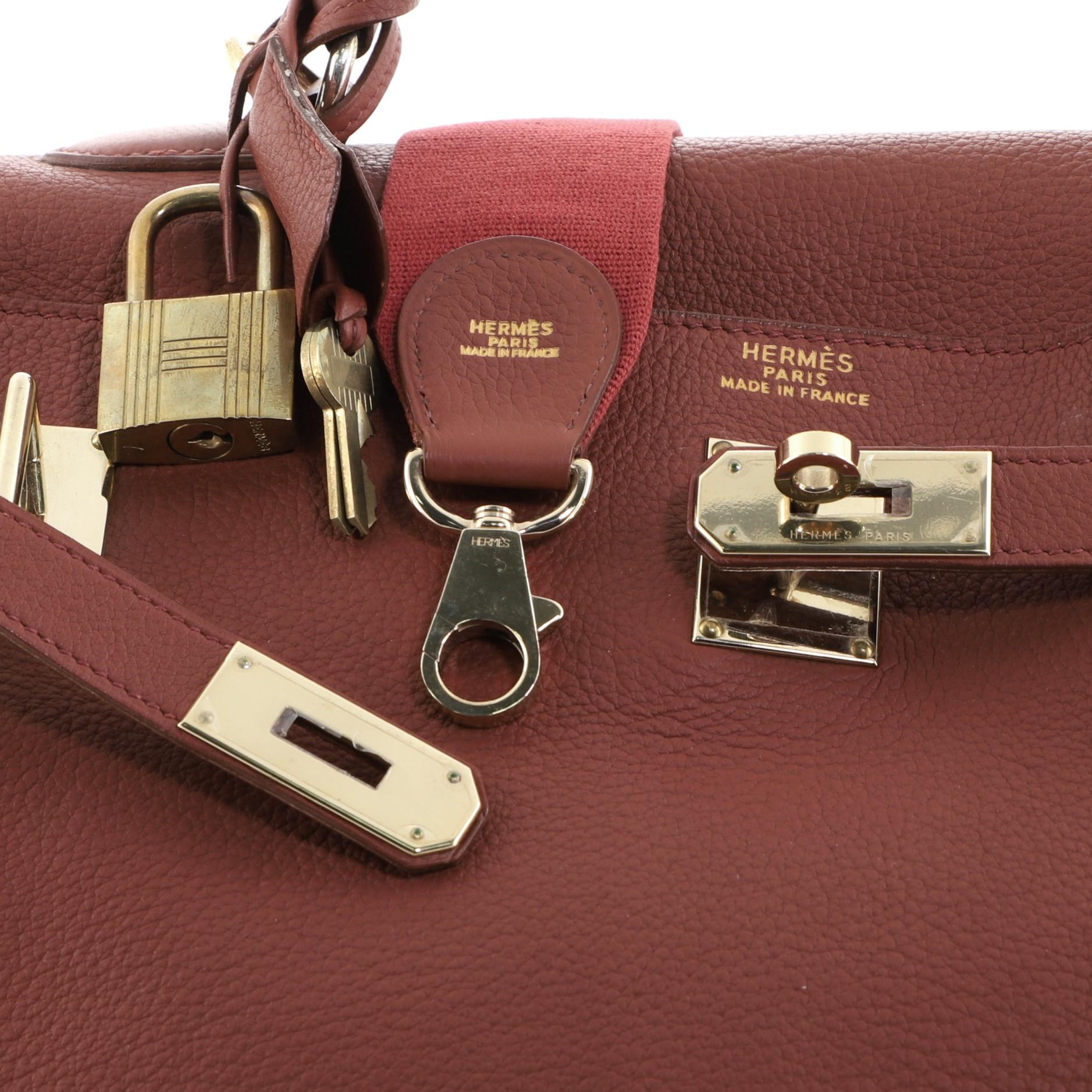 Hermes Kelly Travel Handbag Brique Togo with Gold Hardware 50 In Fair Condition In NY, NY
