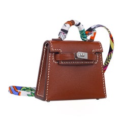 Hermes Kelly Twilly Bag Charm Fauve w/ Palladium Tadelakt Leather New w/Box
