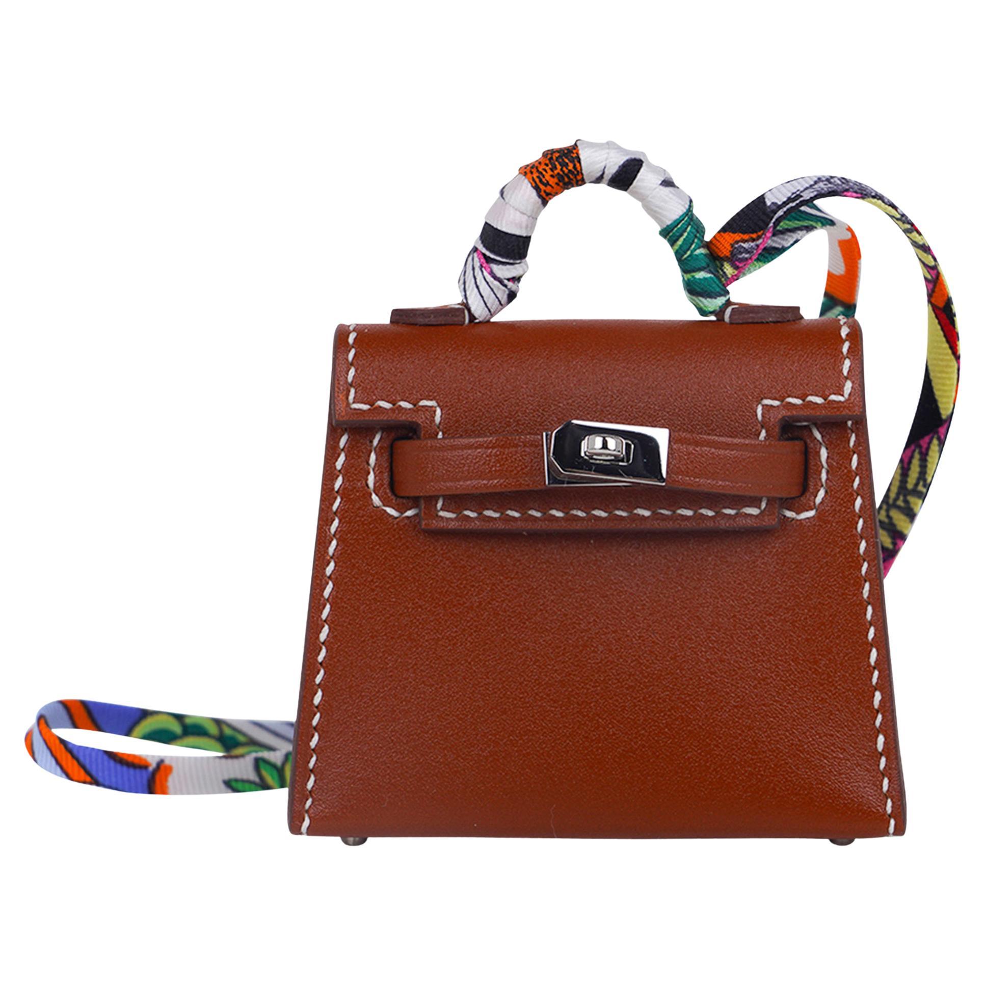 Hermes Kelly Twilly Bag Charm Fauve w/ Palladium Tadelakt Leather New w/Box For Sale