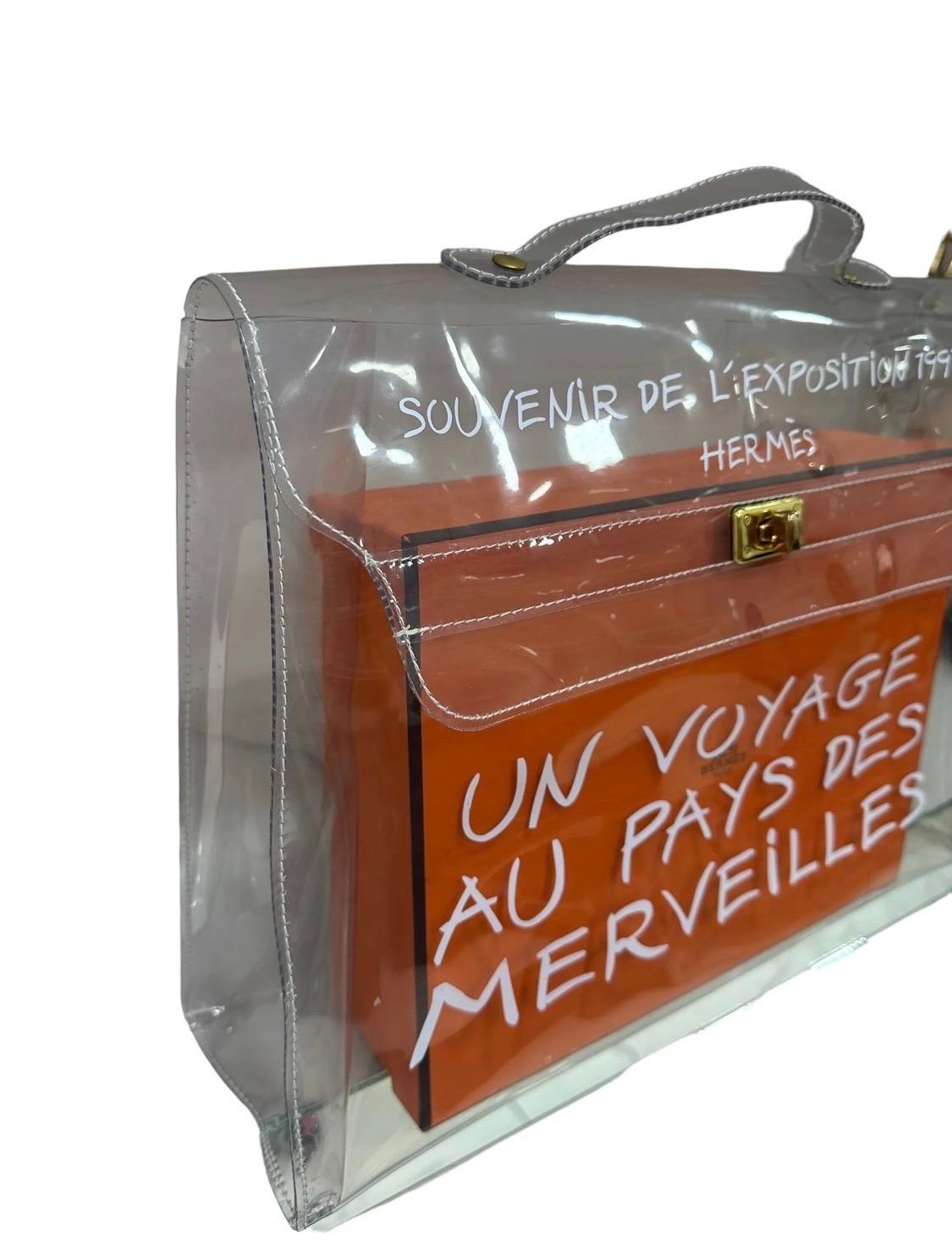 Hermès Kelly Voyage PVC Handschlaufe Trasparente  (Braun) im Angebot