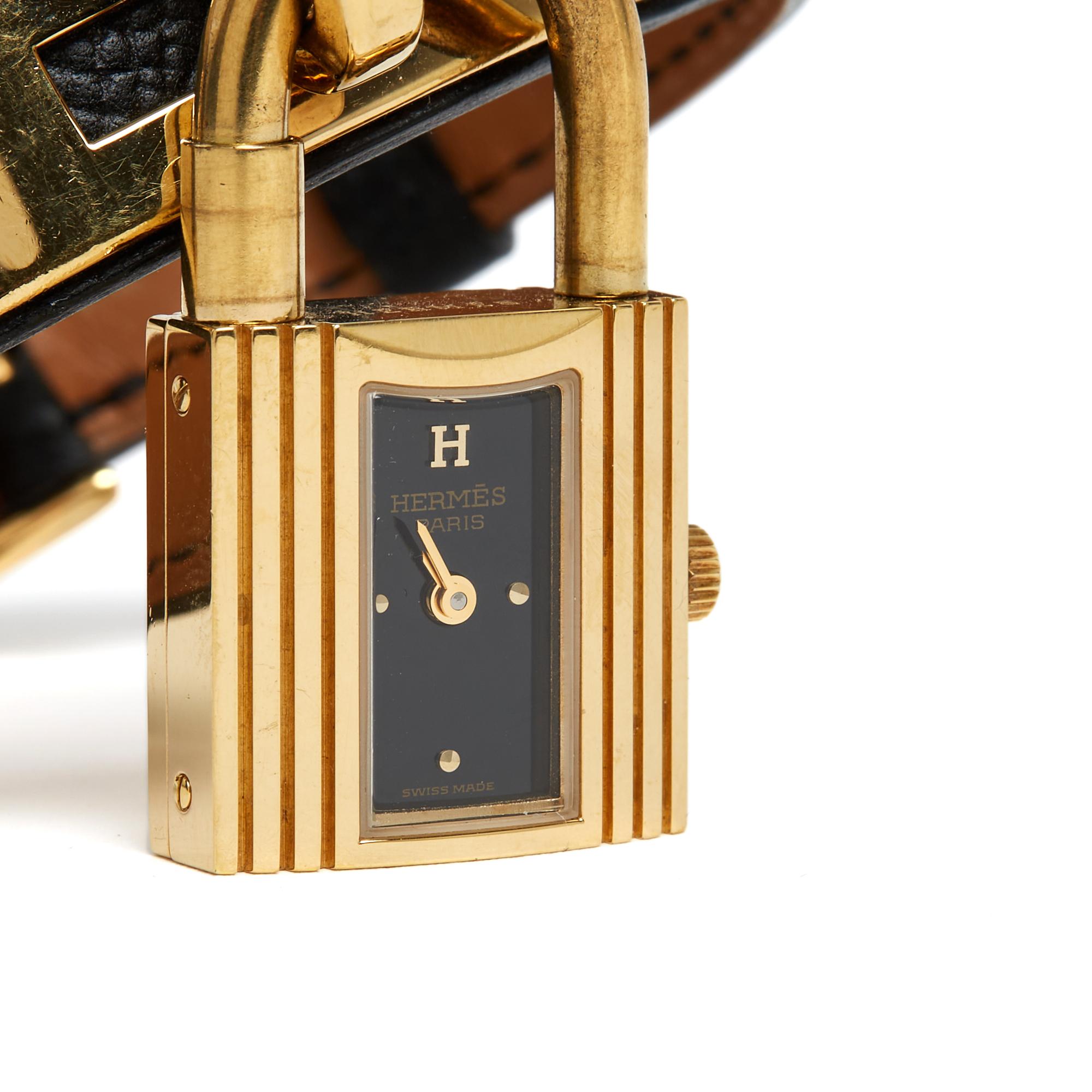 Orologio Hermès Kelly in pelle nera dorata In condizioni ottime in vendita a PARIS, FR