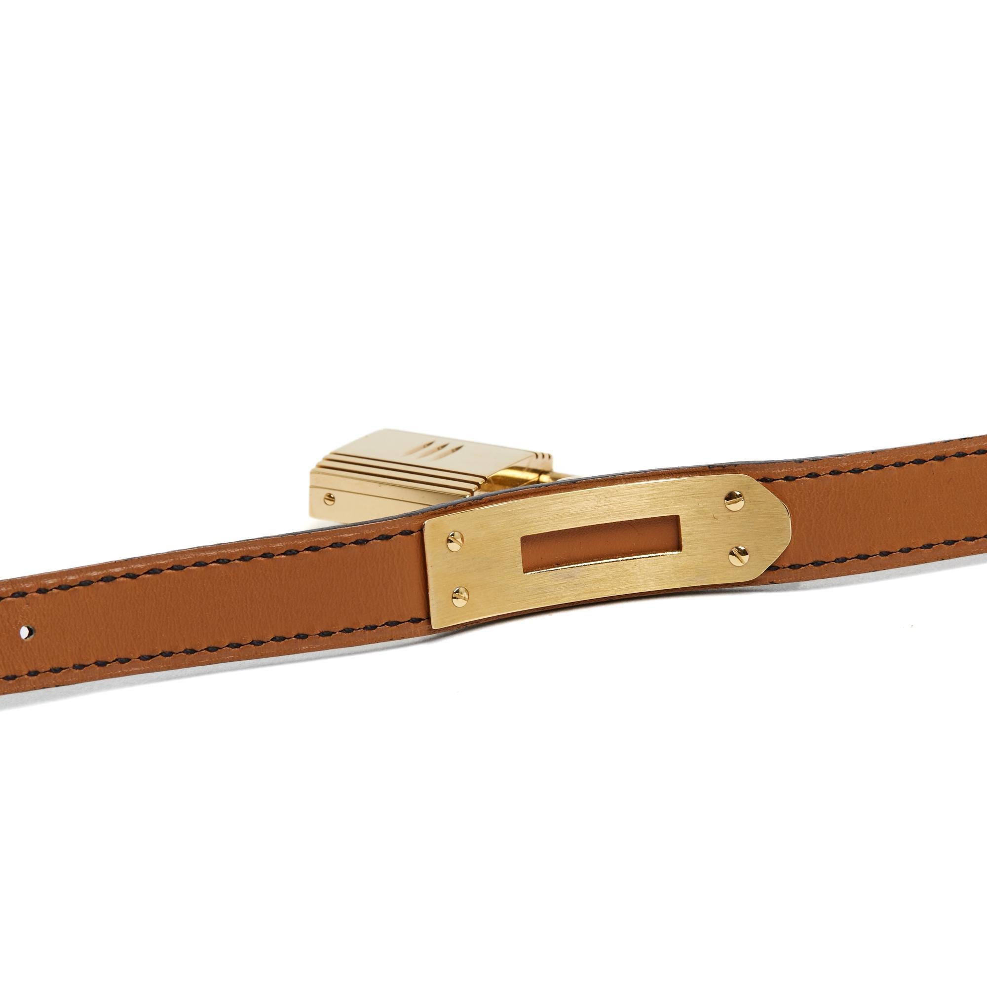 Orologio Hermès Kelly in pelle nera dorata in vendita 2
