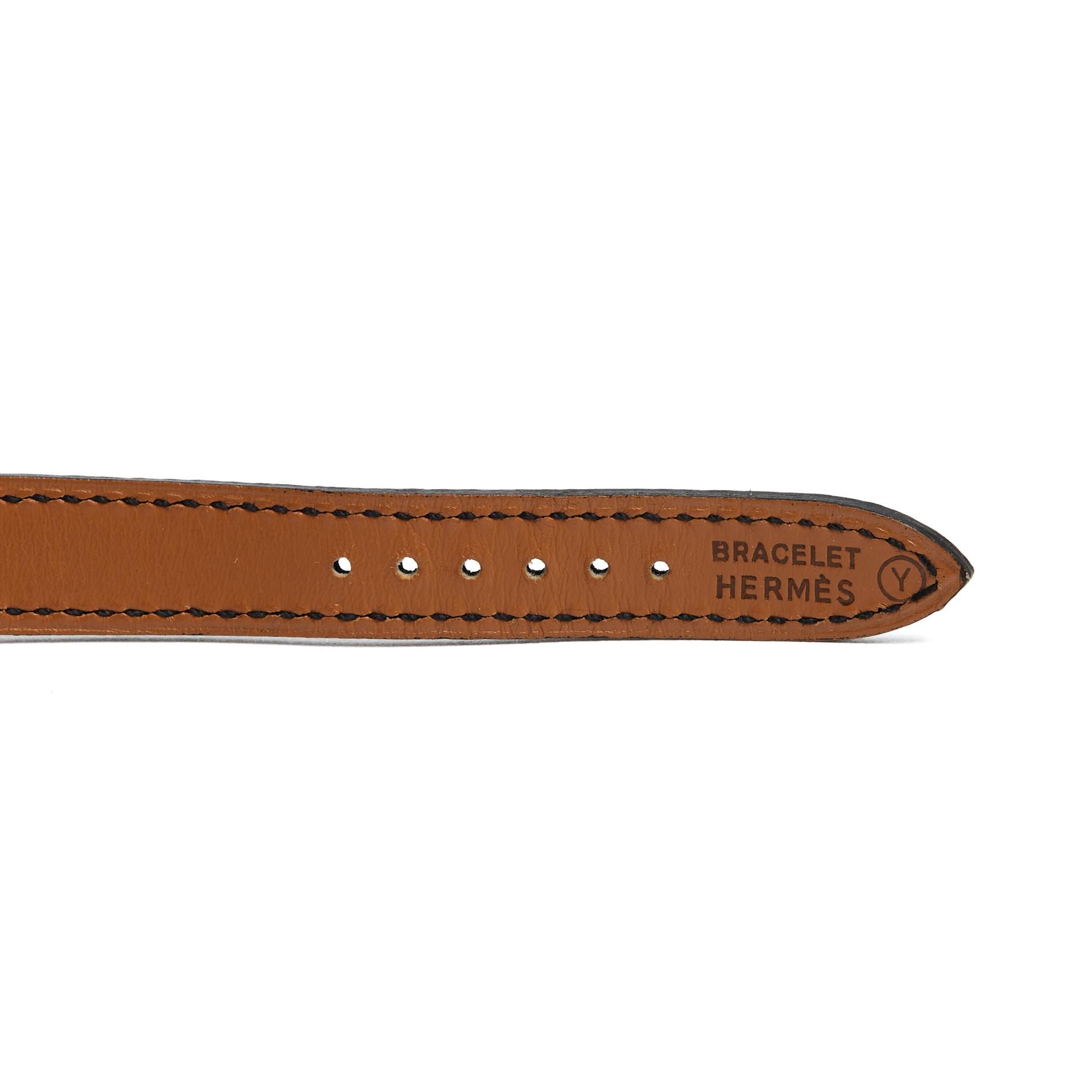Orologio Hermès Kelly in pelle nera dorata in vendita 3