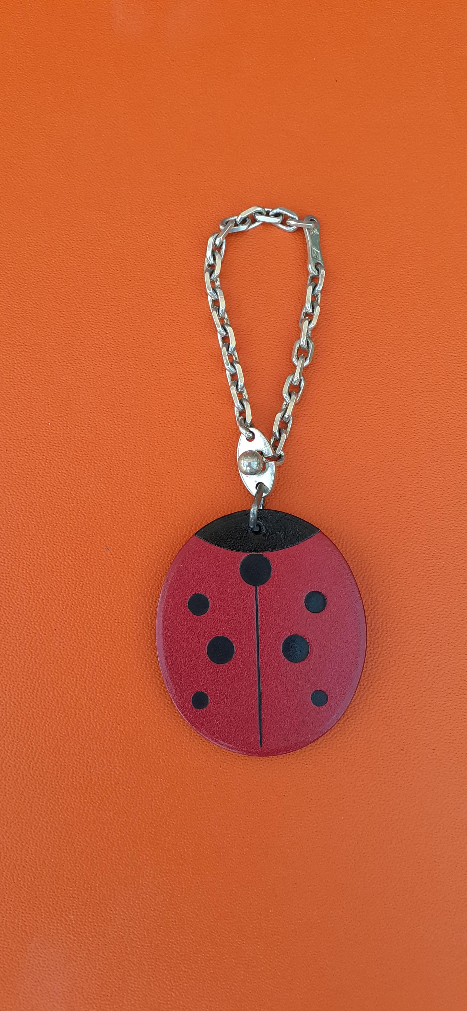 Super Cute Authentic Hermès Key Holder

Can be used as Bag Charm for your Kelly, Birkin or other Hermès Bag

Made in France

In shape of a Ladybug

Made of Smooth Leather and Sterling Silver

Colorways: Red, Black, Silver


