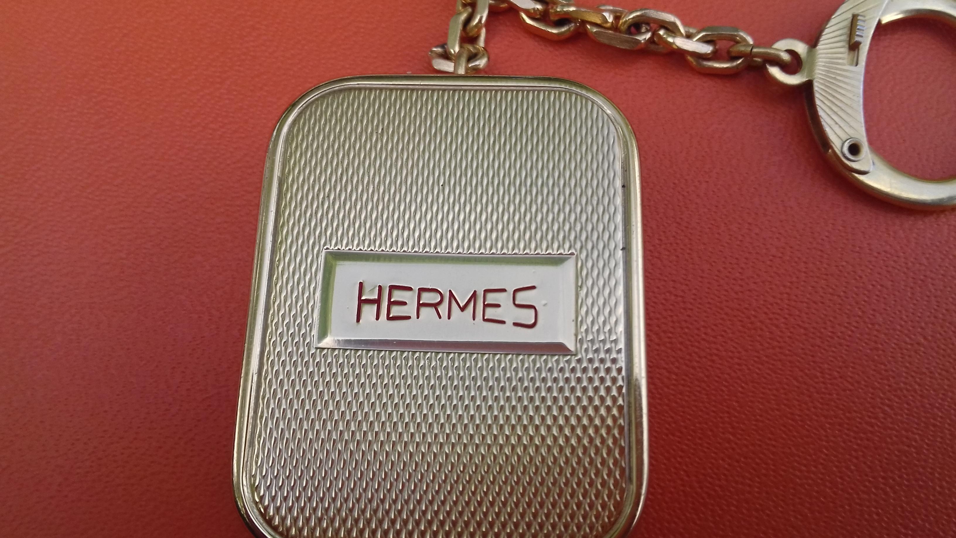 Gray Hermès Keychain Key Ring Key Holder Reuge Sainte Croix Music Box