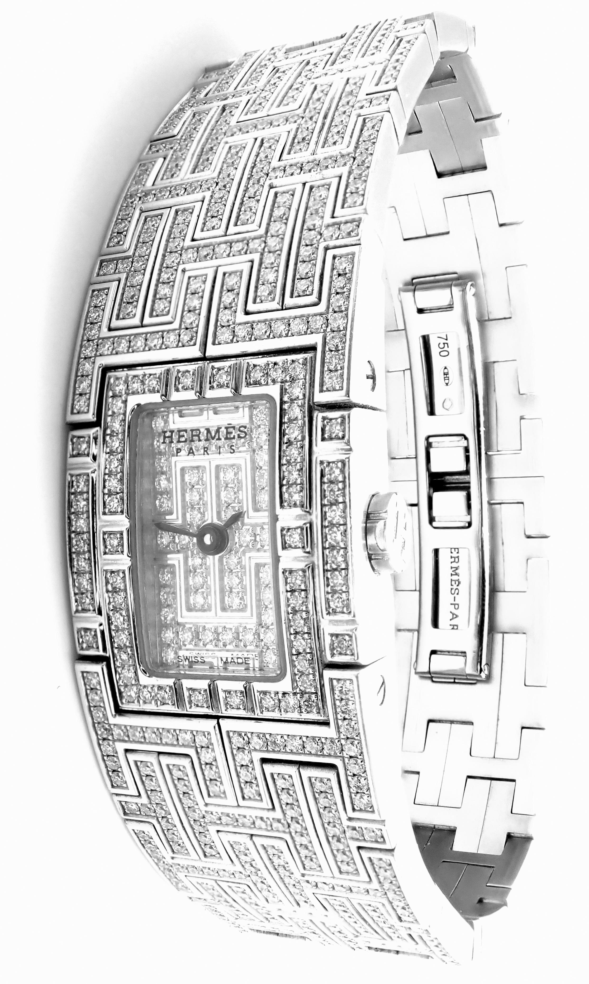 18k White Gold Full Diamond H Bracelet Kilim Ladies Watch by Hermes.  
With 11076 round brilliant cut diamonds VVS1 clarity E color total weight approx. 4ct
This wristwatch comes with original Hermes box.
Details: 
Model: Kilim
Wrist Size:  Length: