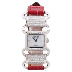 Montre pour femme Hermès Klikti en or blanc et diamants