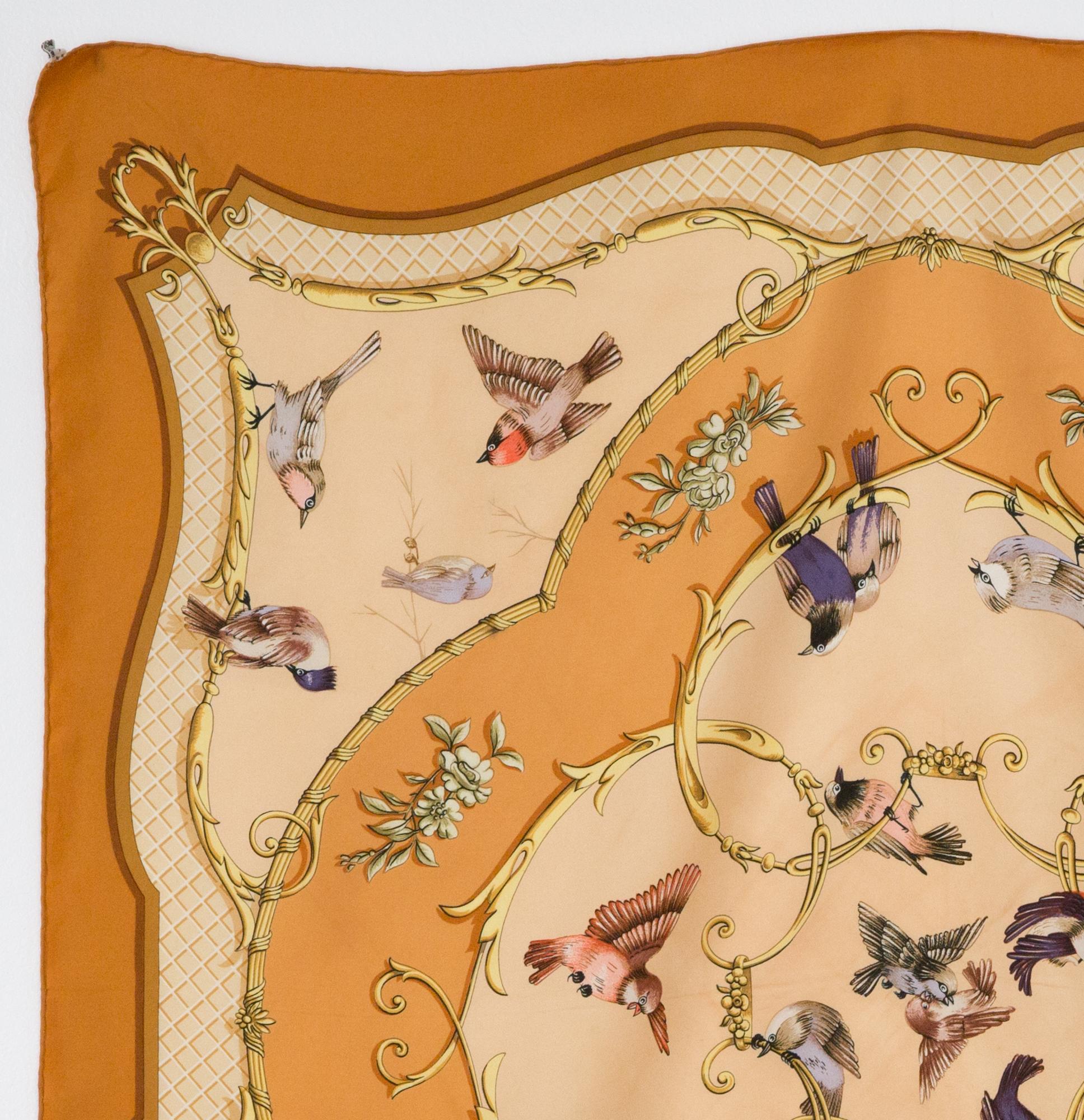 Hermes silk scarf  La Clé Des Champs by F. Faconnet featuring  a birds scene, a light orange border. 
First edition 1965- Reedition 1995
In good vintage condition. Made in France.
35,4in. (90cm)  X 35,4in. (90cm)
We guarantee you will receive this 
