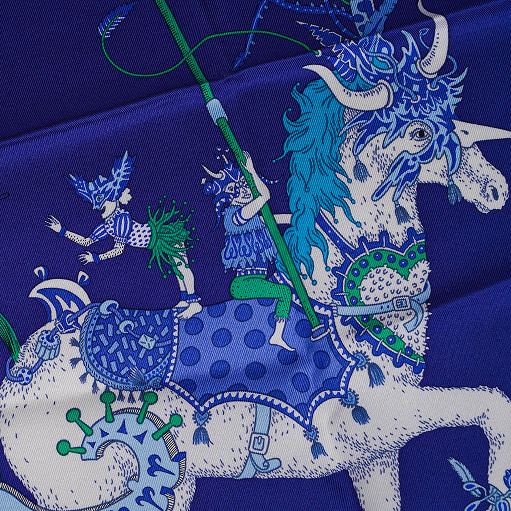 Mightychic offers an  Hermes La Folle Parade silk twill scarf.
Featured in Bleu Azur and Bleu Encre colorway.
Designed by Claire Fanjul, the scarf is inspired by an 18th century engraving
of a carnival float.
Hand rolled edge.
Comes with Signature