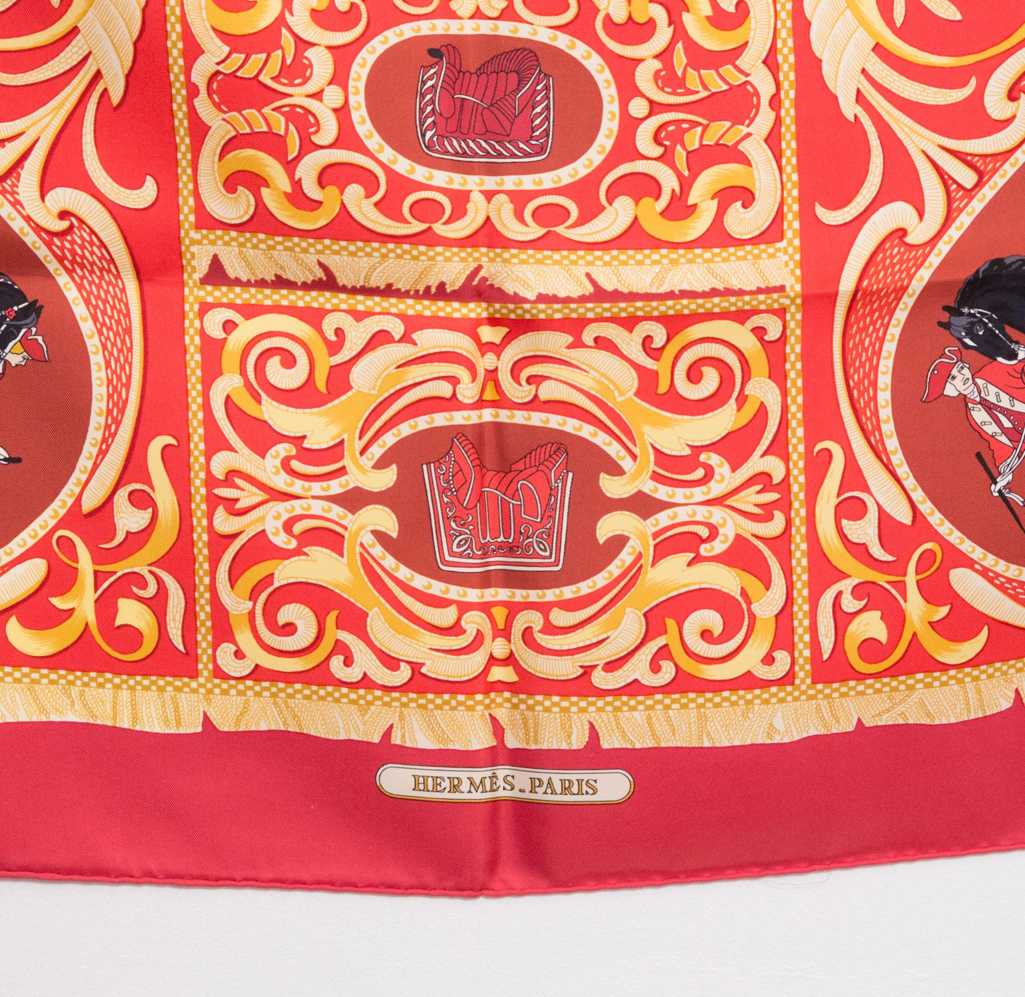 Hermes silk scarf La Presentation by Christiane Vauzelles featuring a red border.
In good vintage condition. Made in France.
35,4in. (90cm)  X 35,4in. (90cm)
We guarantee you will receive this  iconic item as described and showed on photos.
(please