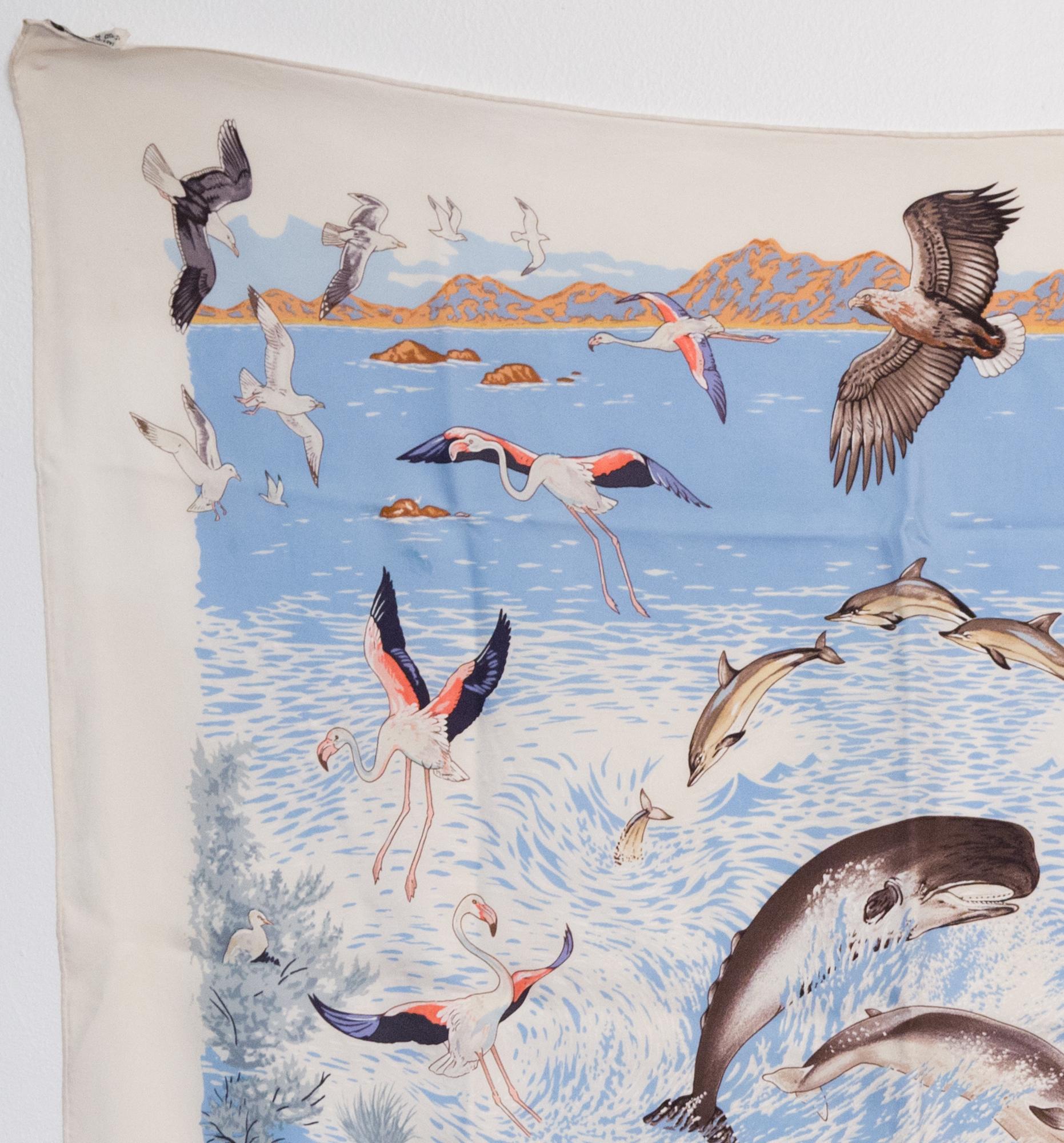 Hermes silk scarf La Vie Precieuse de la Méditerranée by Robert Dallet featuring a fish scene.
First edition 1992.
In good vintage condition. Made in France.
35,4in. (90cm)  X 35,4in. (90cm)
We guarantee you will receive this  iconic item as