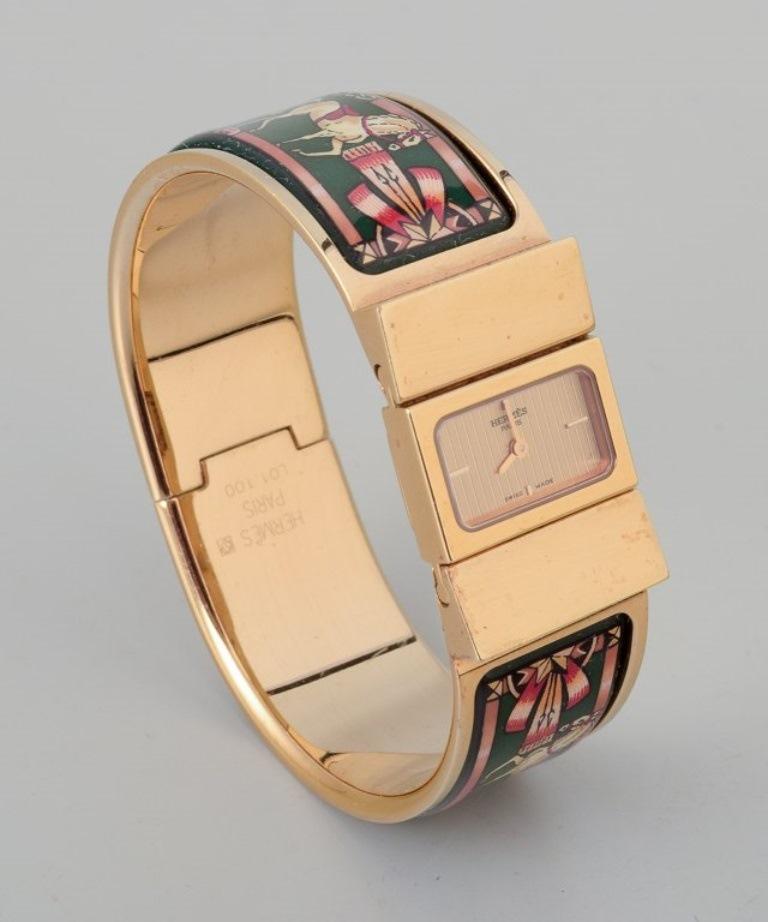 Hermes, ladies' wristwatch. Made of gilded metal and enamel work.
Model: 