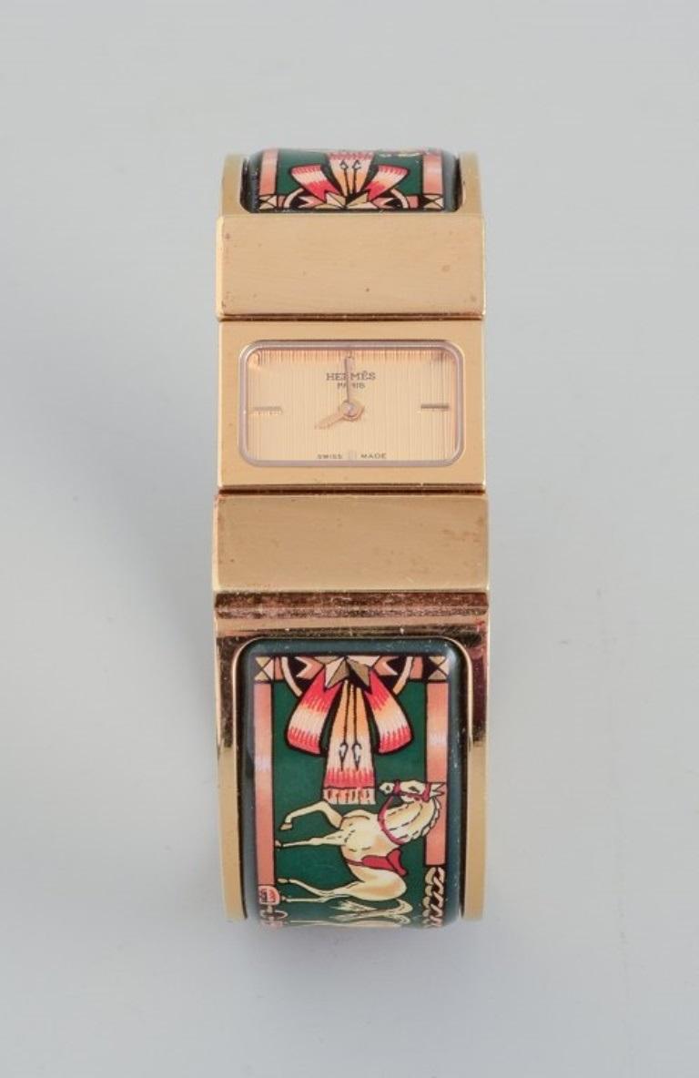 Hermes, ladies' wristwatch. Made of gilded metal and enamel work. For Sale 3