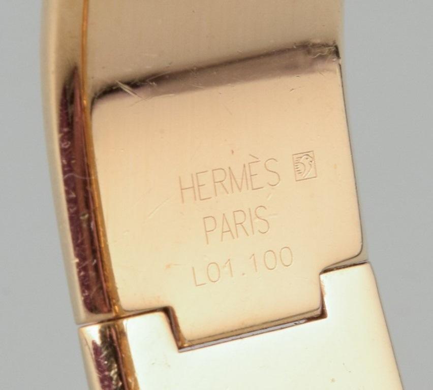 Hermes, ladies' wristwatch. Made of gilded metal and enamel work. For Sale 4
