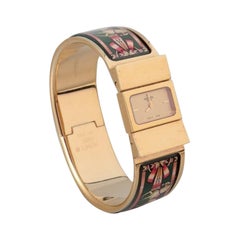 Vintage Hermes, ladies' wristwatch. Made of gilded metal and enamel work.