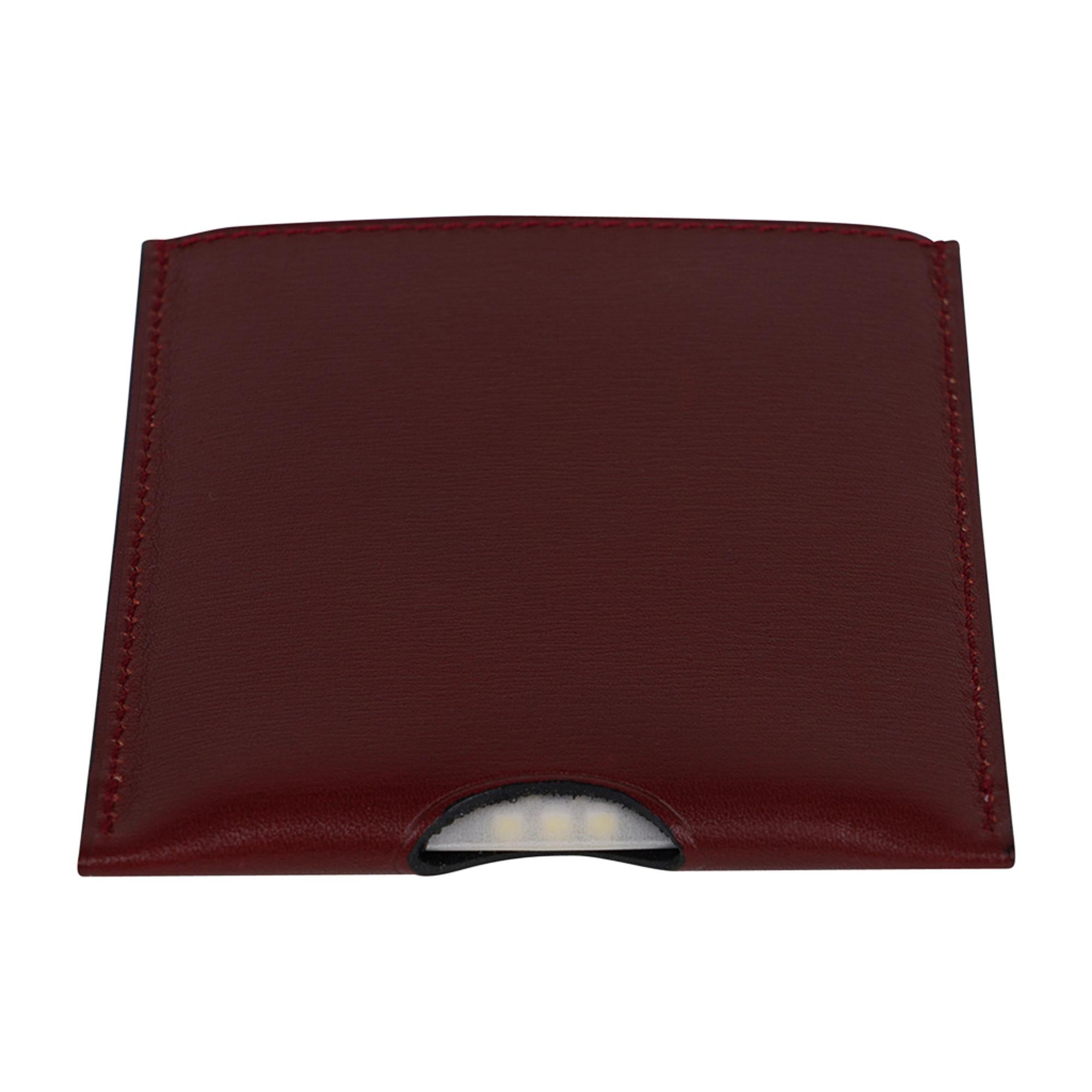 Hermes Lampe de Poche In the Pocket Bordeaux Swift Leather In New Condition For Sale In Miami, FL