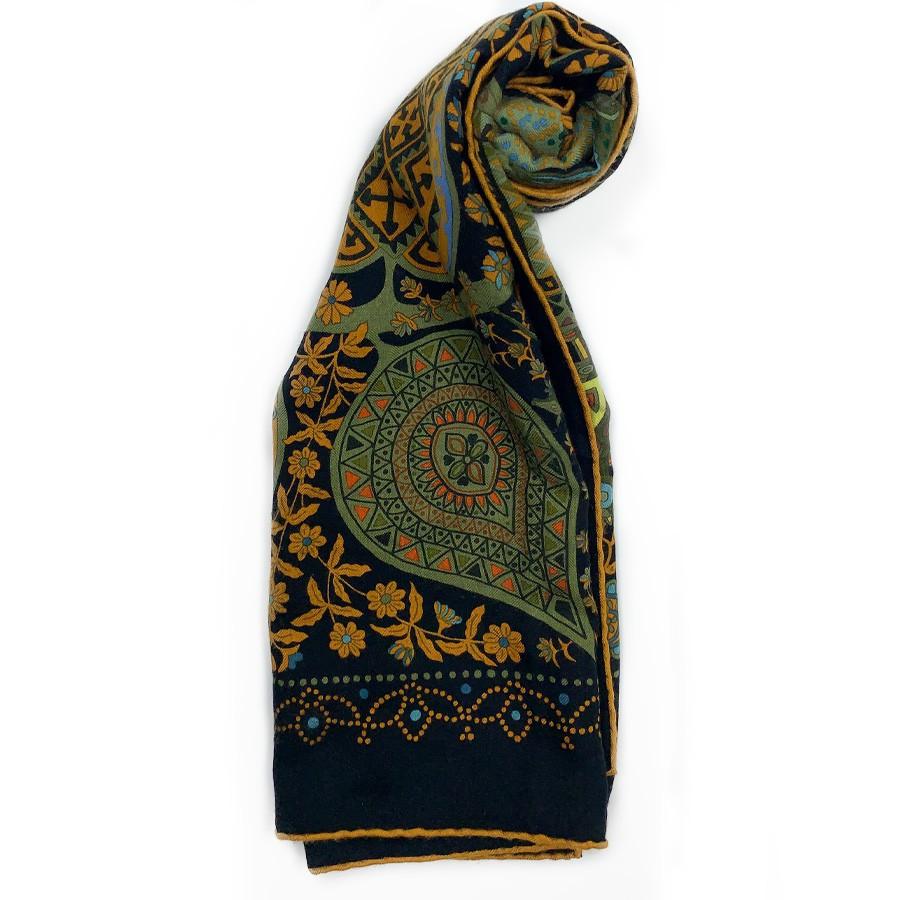 HERMES L'arbre de Vie shawl in cashmere and silk. Designed by Christine Henry, it tells the link that unites man and plants. Each leaf of the scarf holds geometric shapes telling of various cultures. It protects against misfortune and invokes luck.
